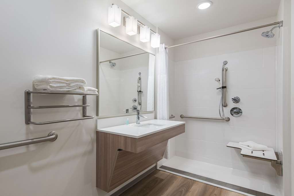 WOODSPRING SUITES TRI-CITIES RICHLA-guestroom-Guest Room,Bathroom,On-Site.jpg