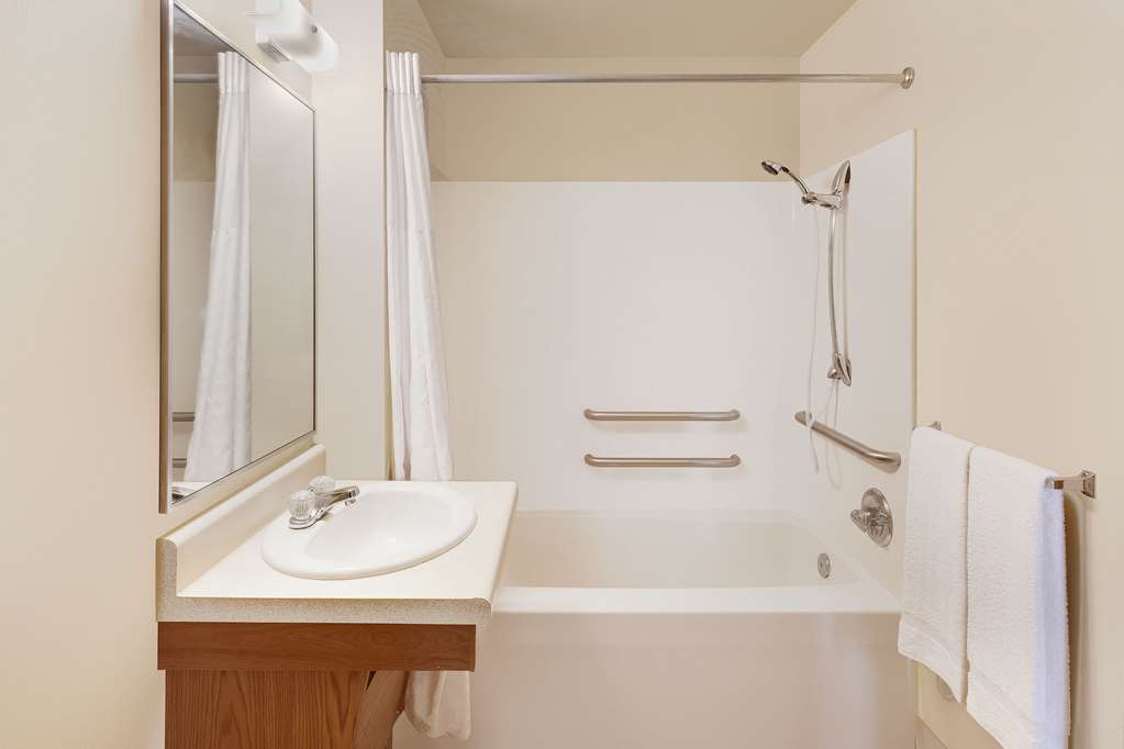 WOODSPRING SUITES DES MOINES PLEASA-guestroom-Guest Room,Bathroom,On-Site.jpg