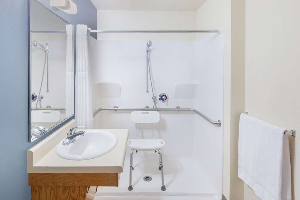WOODSPRING SUITES ANKENY DES MOINES-guestroom-Guest Room,Bathroom,On-Site.jpg