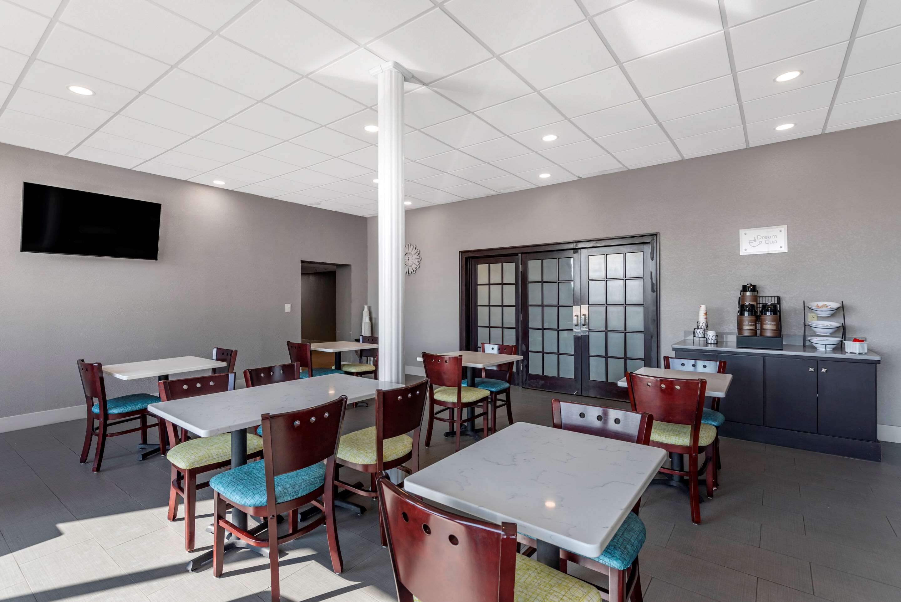 Enjoy breakfast in this seating area | Sleep Inn Terre Haute University Area