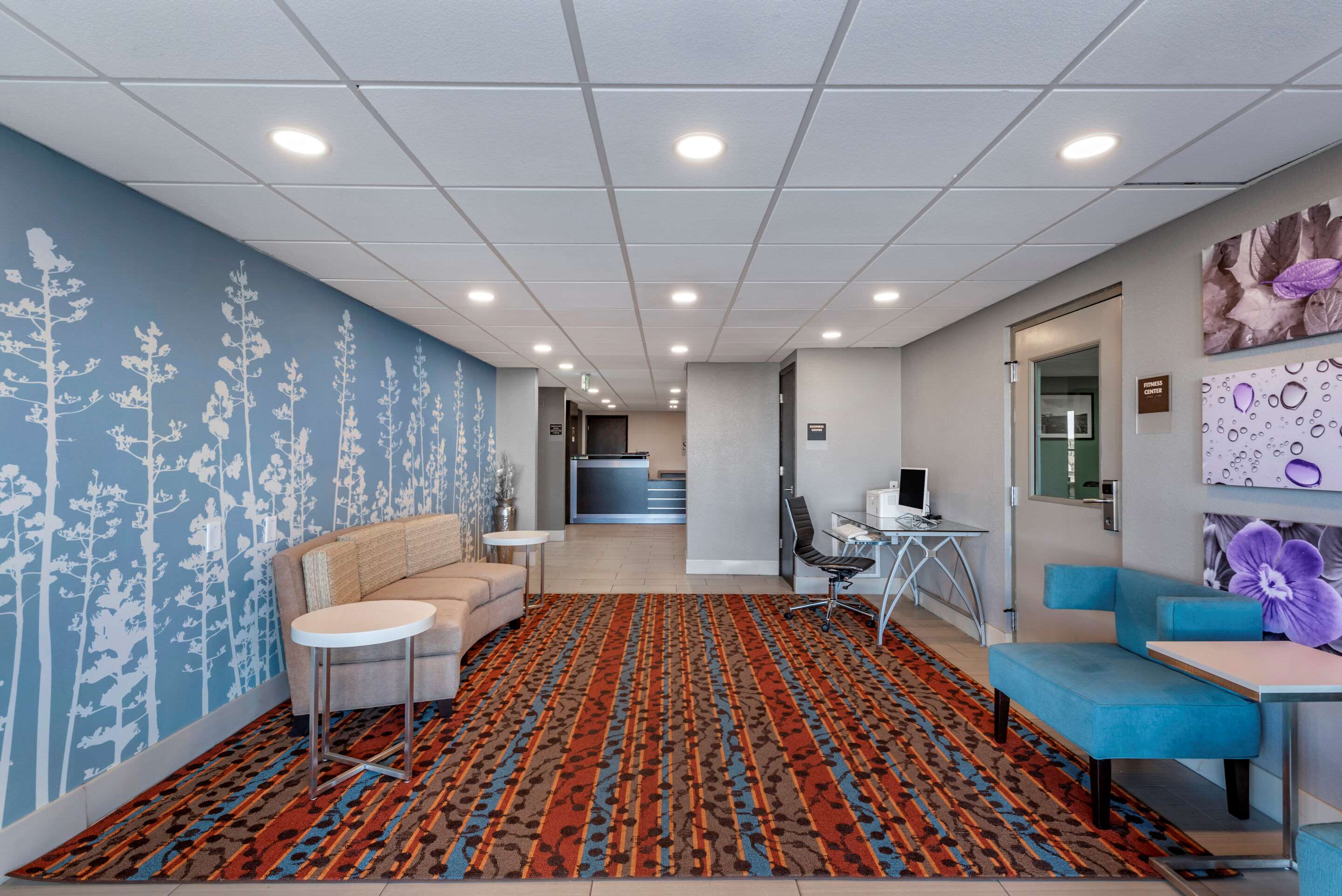 Spacious lobby with sitting area | Sleep Inn Terre Haute University Area