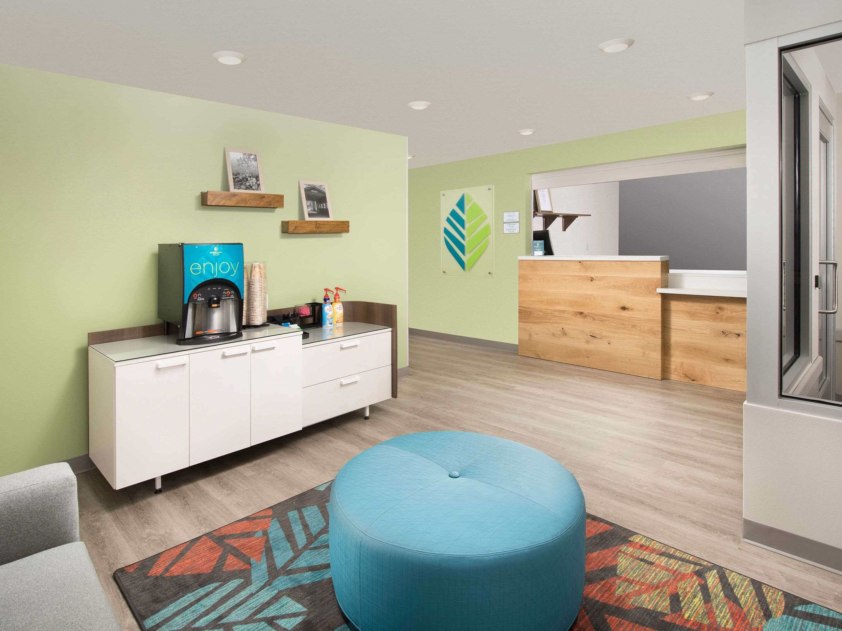 Lobby with sitting area | WoodSpring Suites Toledo Maumee