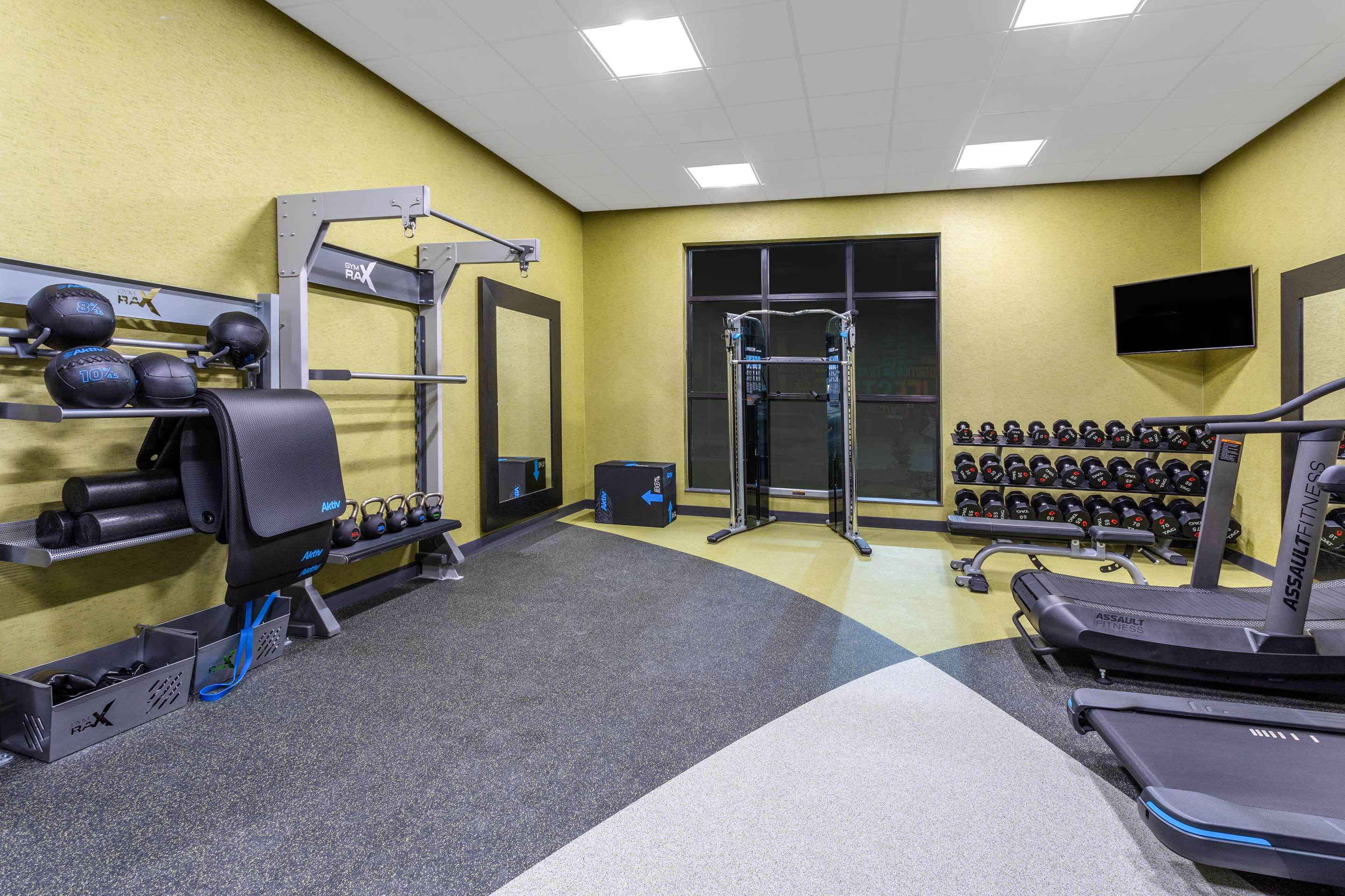 Health club fitness center gym | Hilton Garden Inn Hays