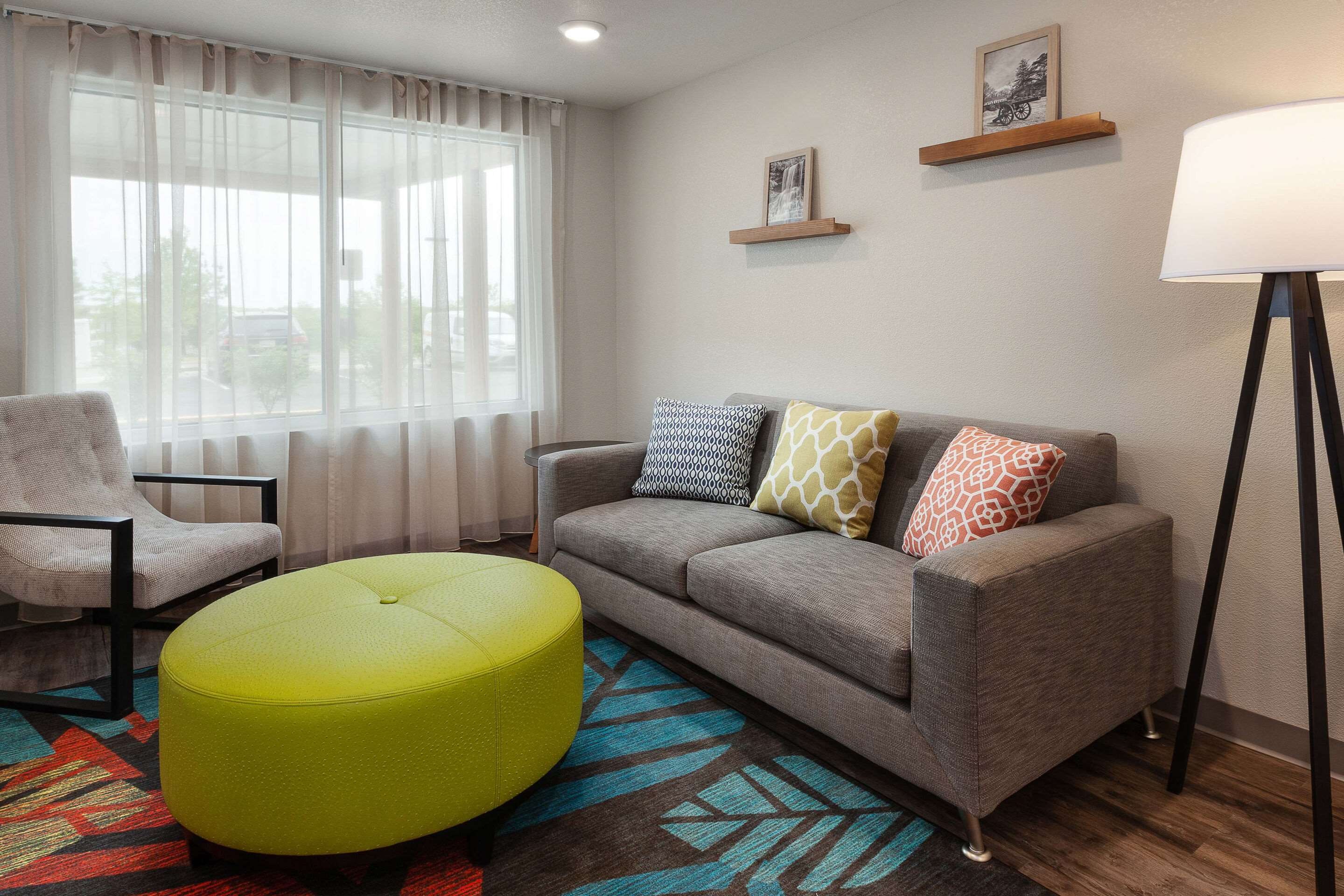 Lobby with sitting area | WoodSpring Suites Quantico