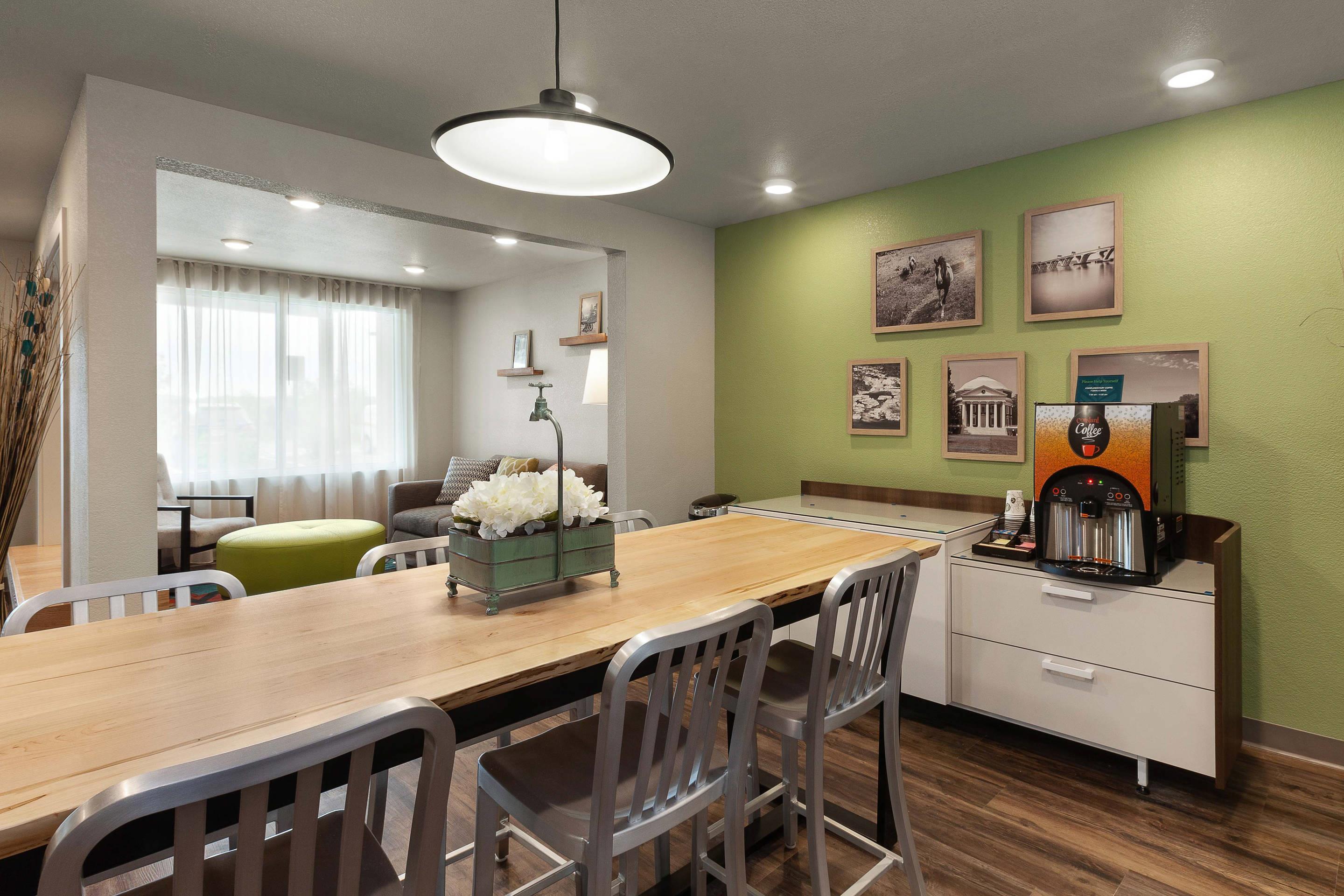 Lobby with sitting area | WoodSpring Suites Quantico