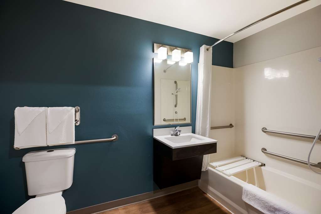 WOODSPRING SUITES ORLANDO WEST - CL-guestroom-Guest Room,Bathroom,On-Site.jpg