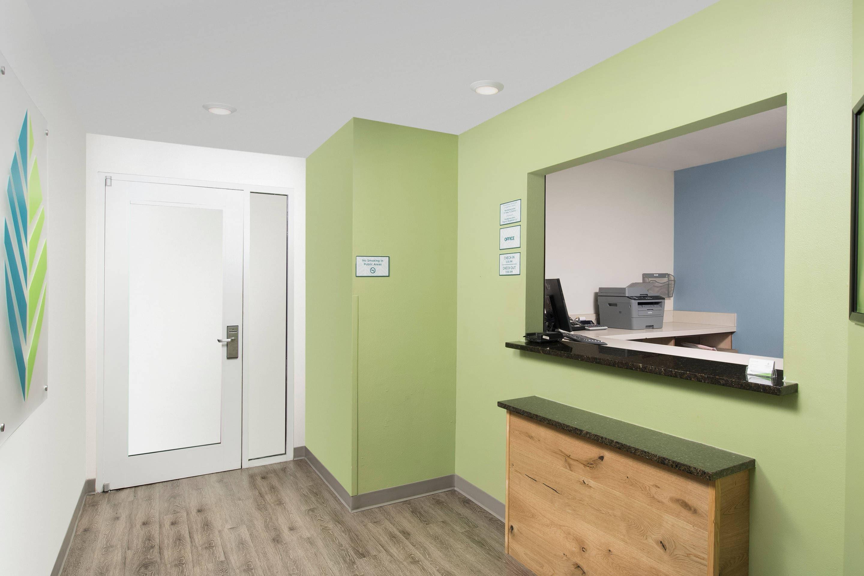 Front desk | WoodSpring Suites Orlando International Drive