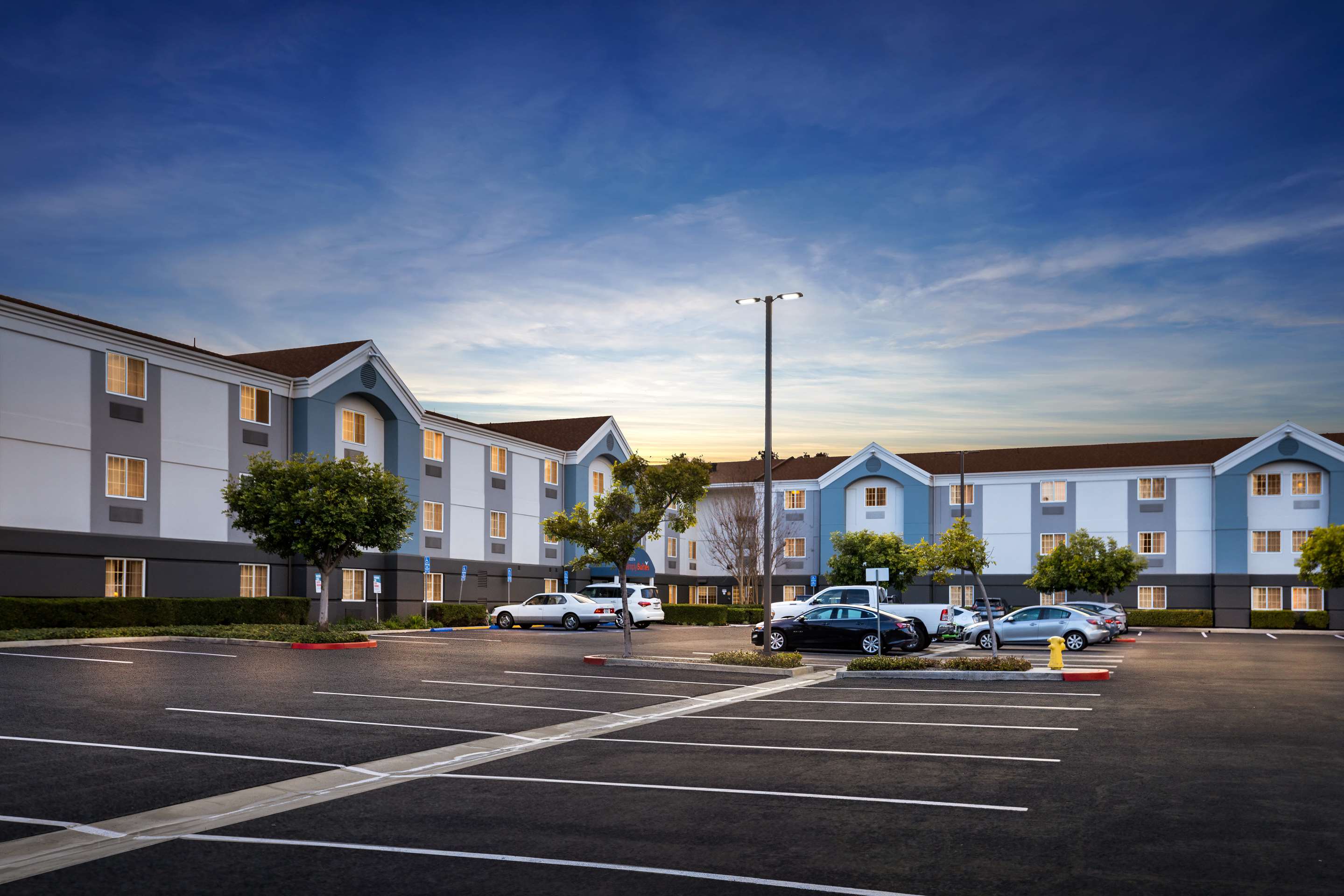 Hotel Property Exterior at Twilight | Sonesta Simply Suites Irvine East Foothill