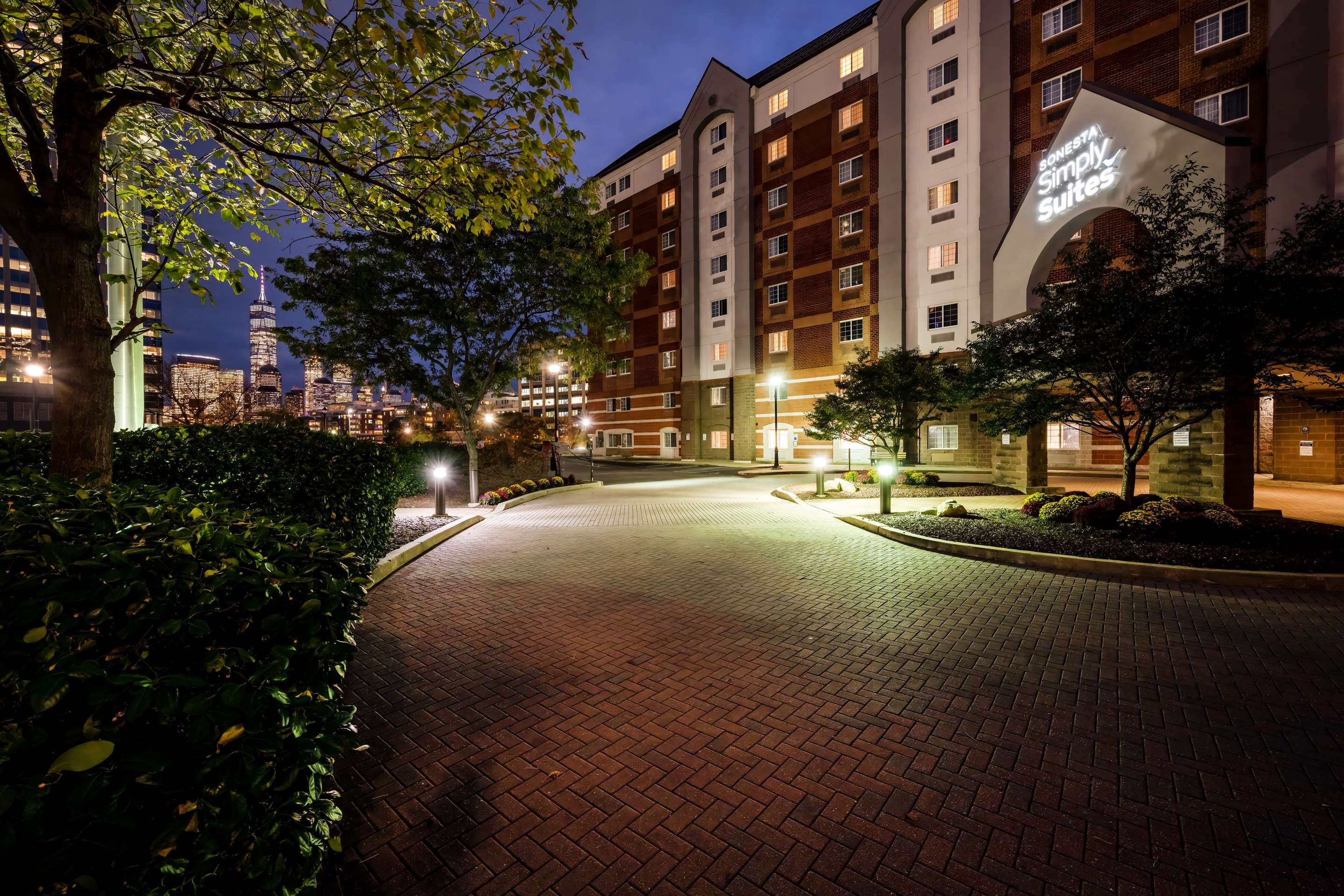 Exterior Driveway at Twilight | Sonesta Simply Suites Jersey City