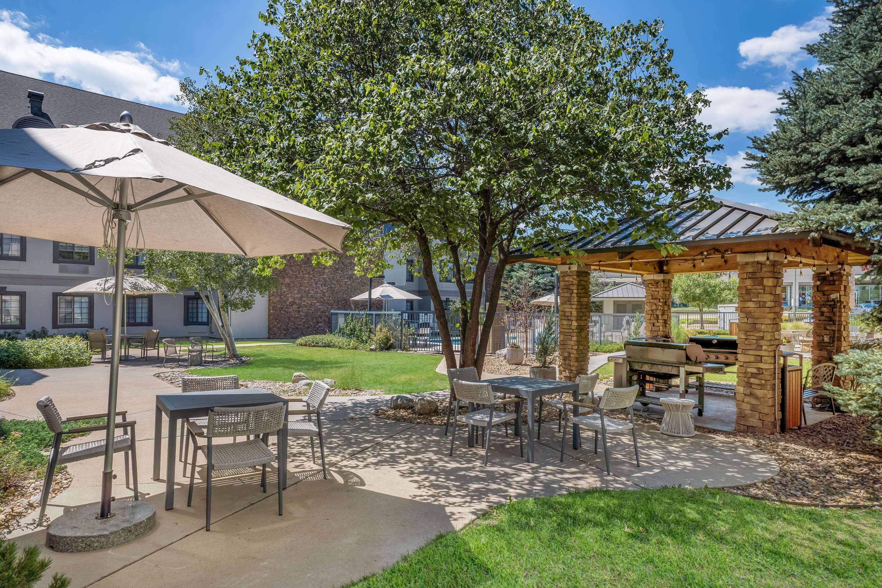 Outdoor Patio and BBQ Area | Denver Marriott South at Park Meadows