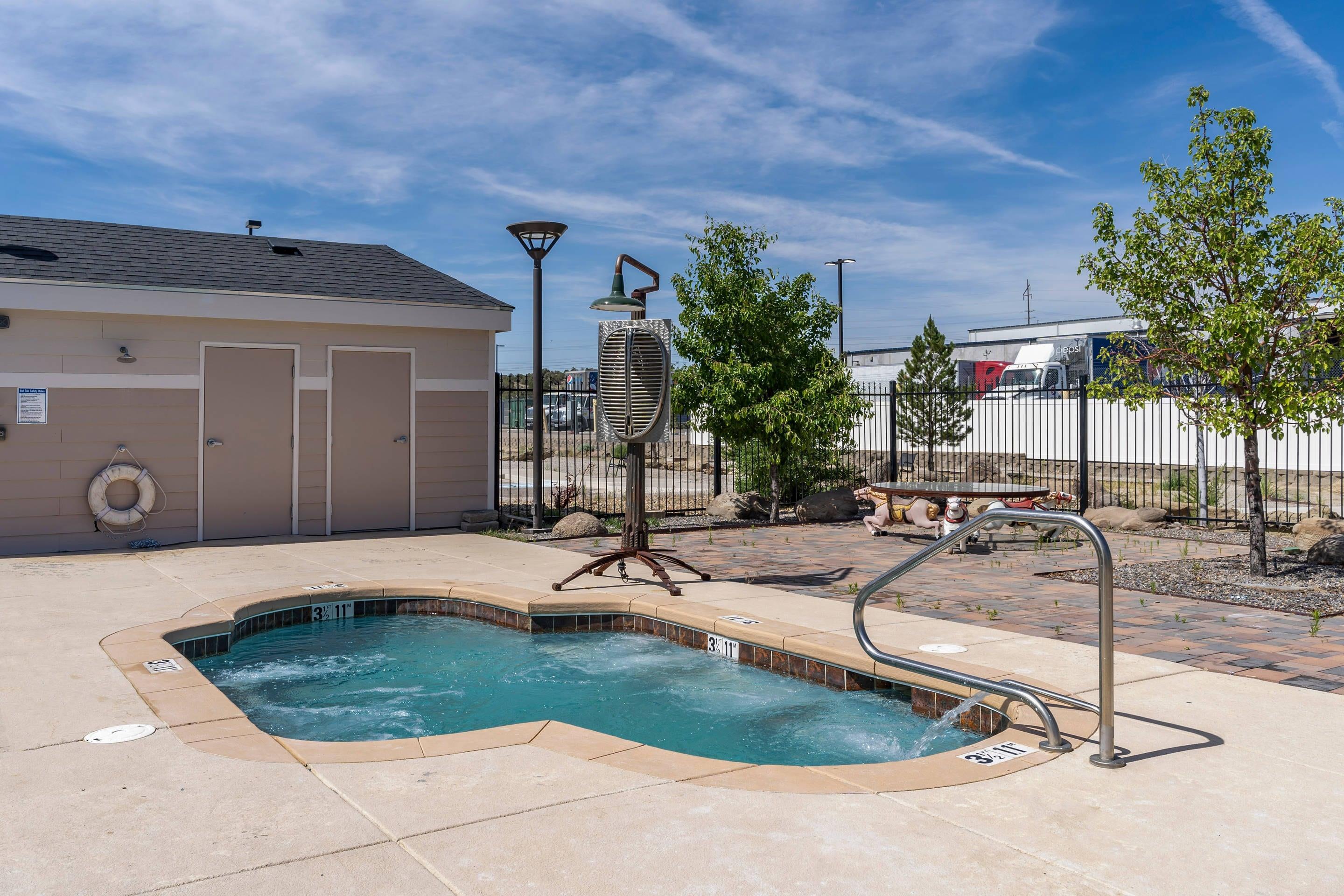 Relax in the hot tub | Presidential Inn & Suites