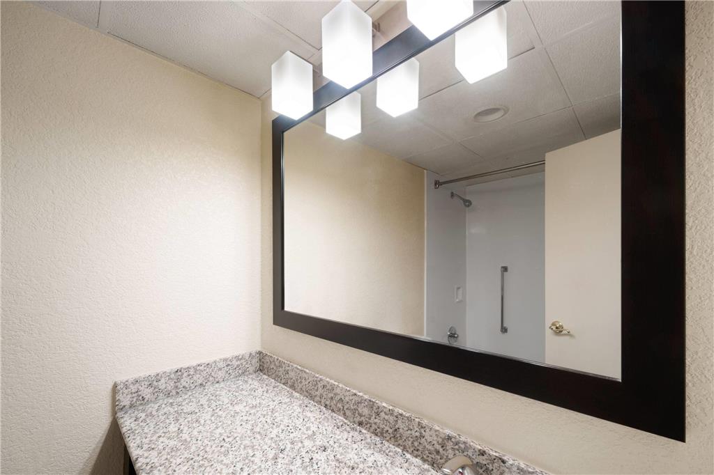 VILLAGE INN EVENT CENTER, TRADEMARK-guestroom-Guest Room,Bathroom,On-Site.jpg