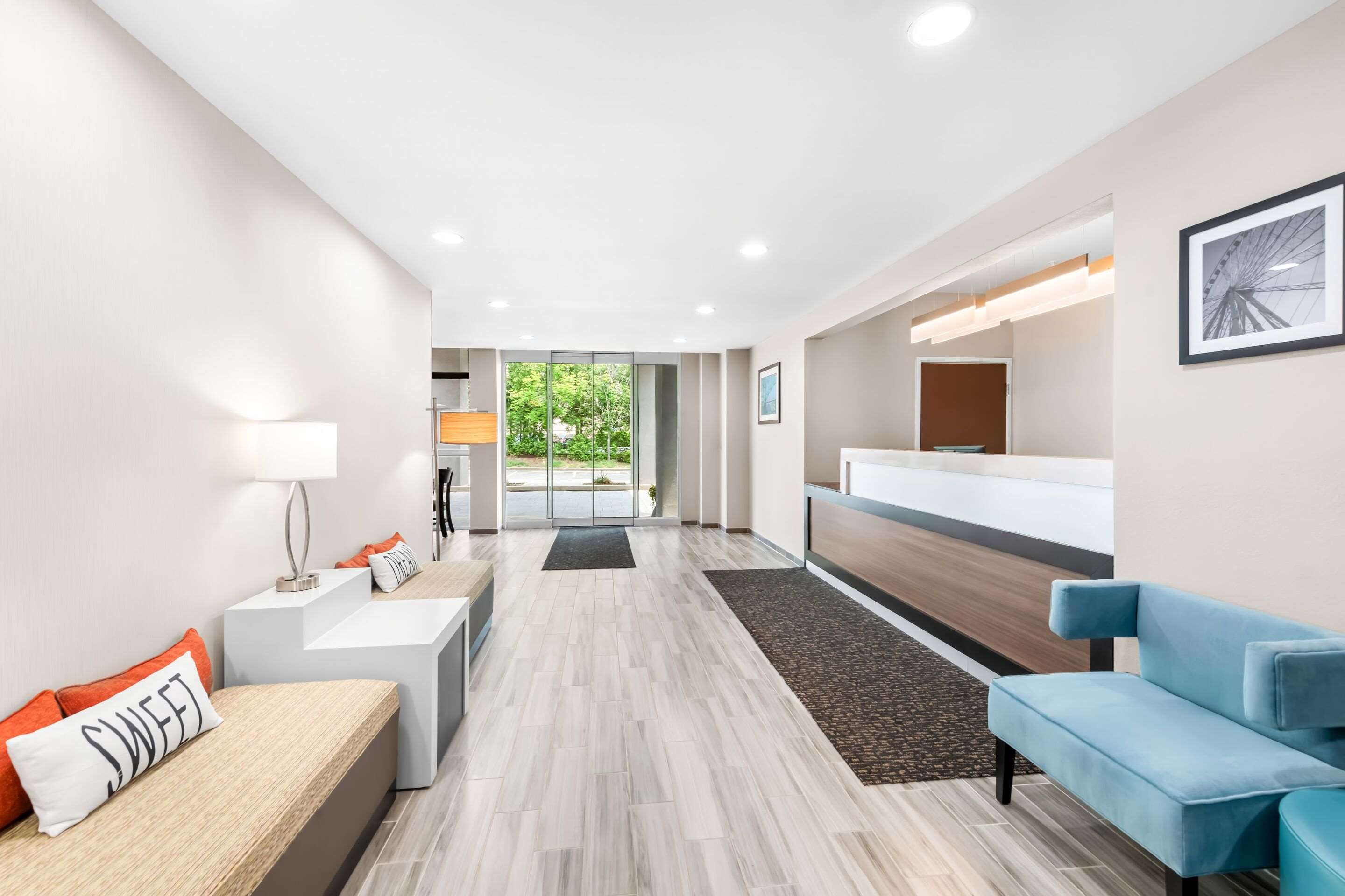 Lobby with sitting area | Rodeway Inn