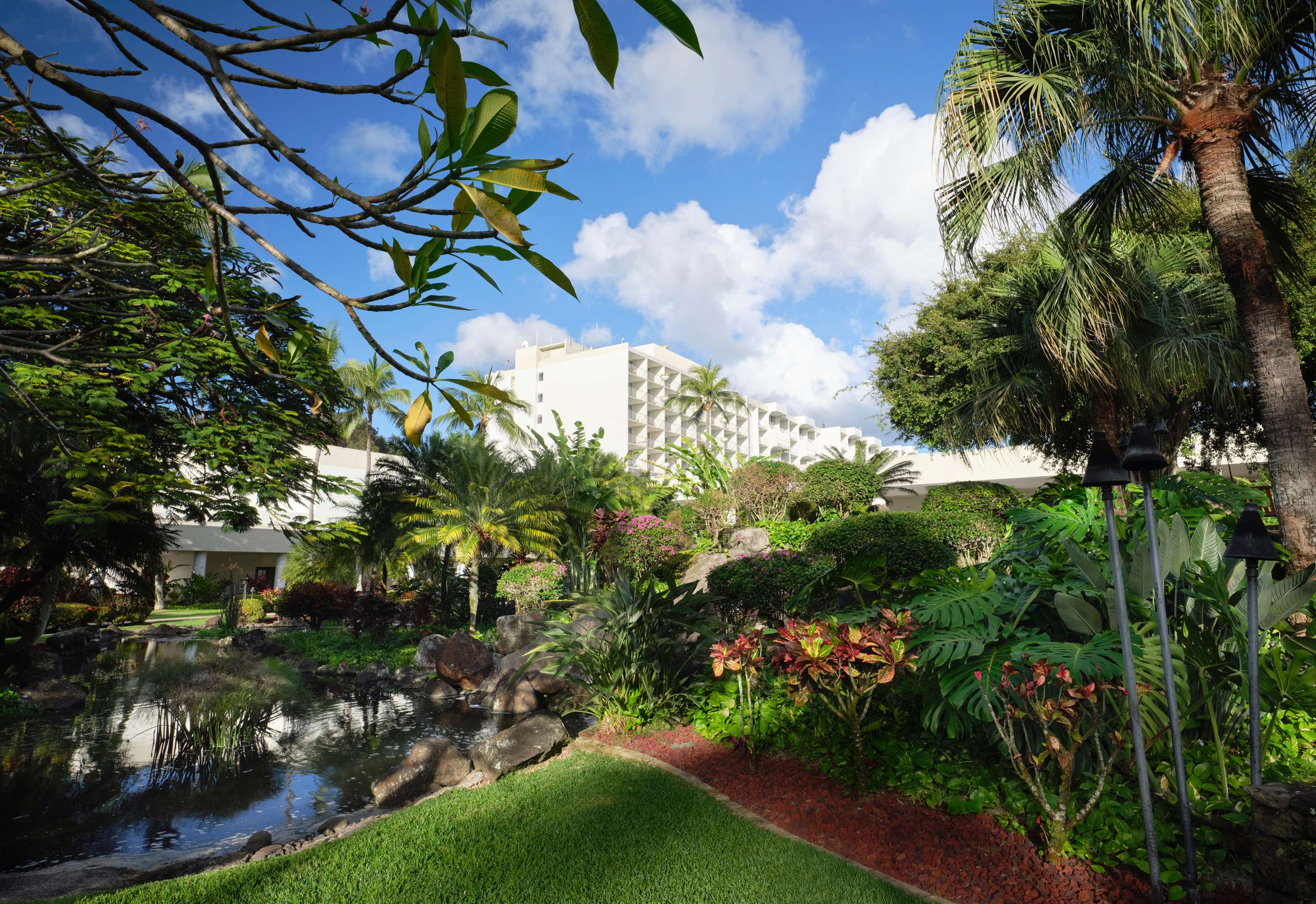 TRS Kauai Exterior View Of Hotel From Garden