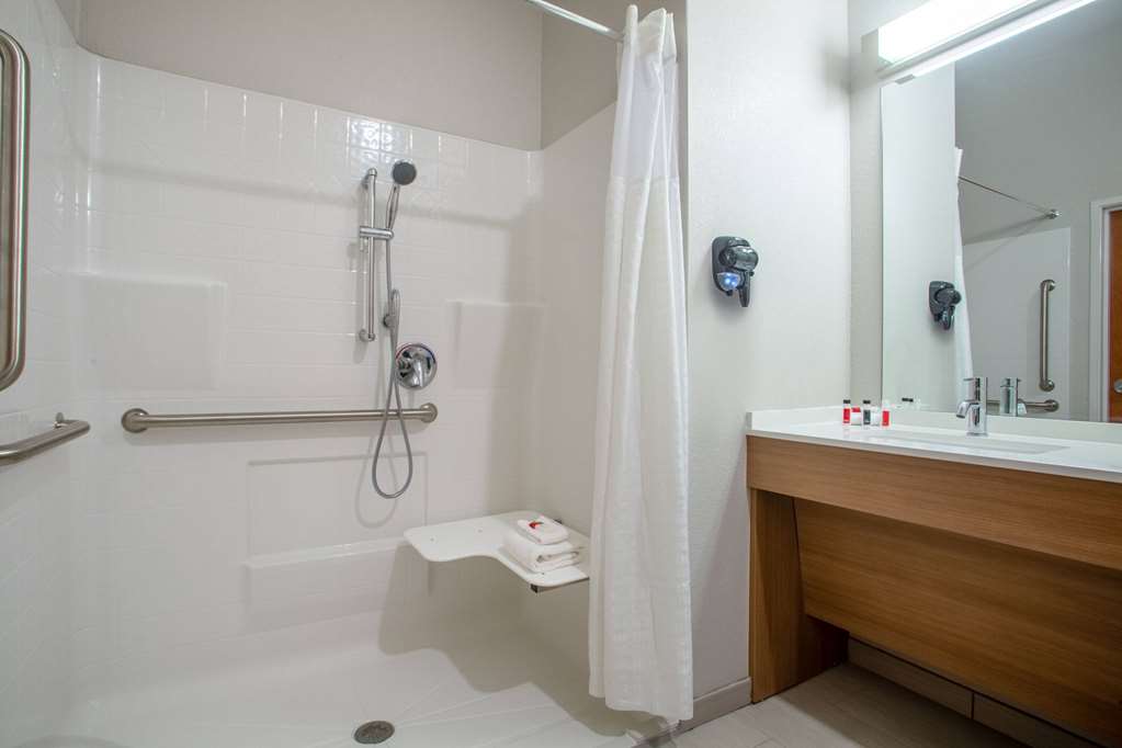 MICROTEL INN & SUITES BY WYNDHAM LI-guestroom-Guest Room,Bathroom,Shower,Accessibility,On-Site.jpg
