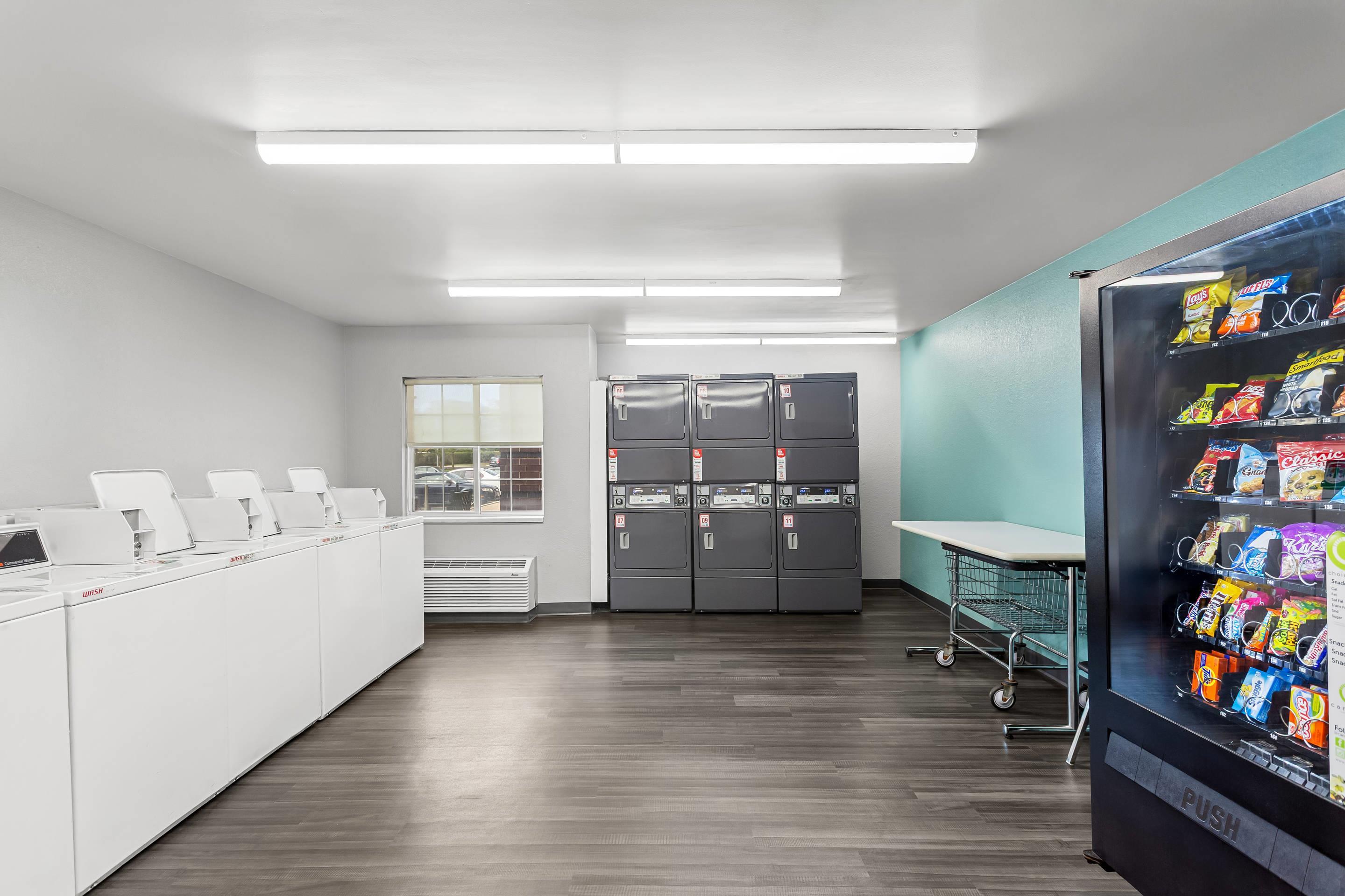 Guest laundry facilities and vending machine area | MainStay Suites Chicago Hoffman Estates