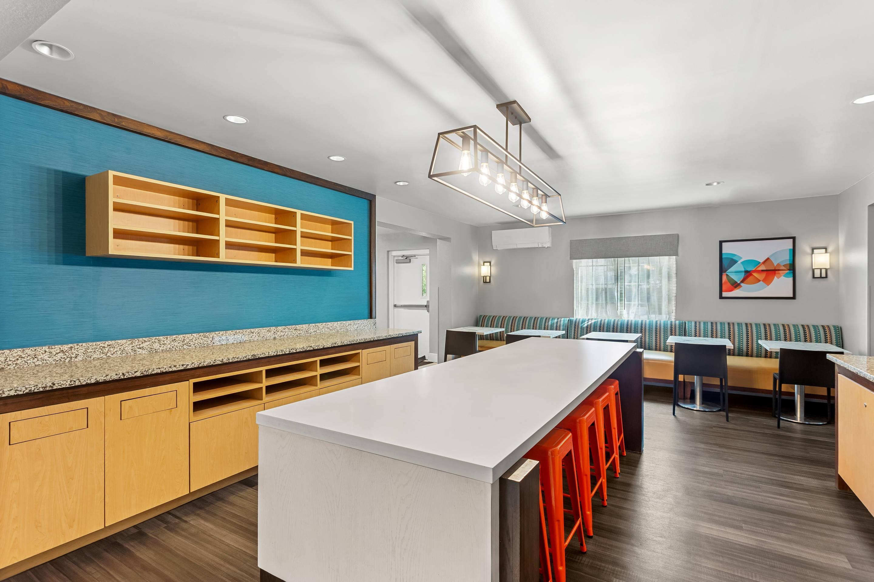 Enjoy breakfast in this seating area | MainStay Suites Chicago Hoffman Estates
