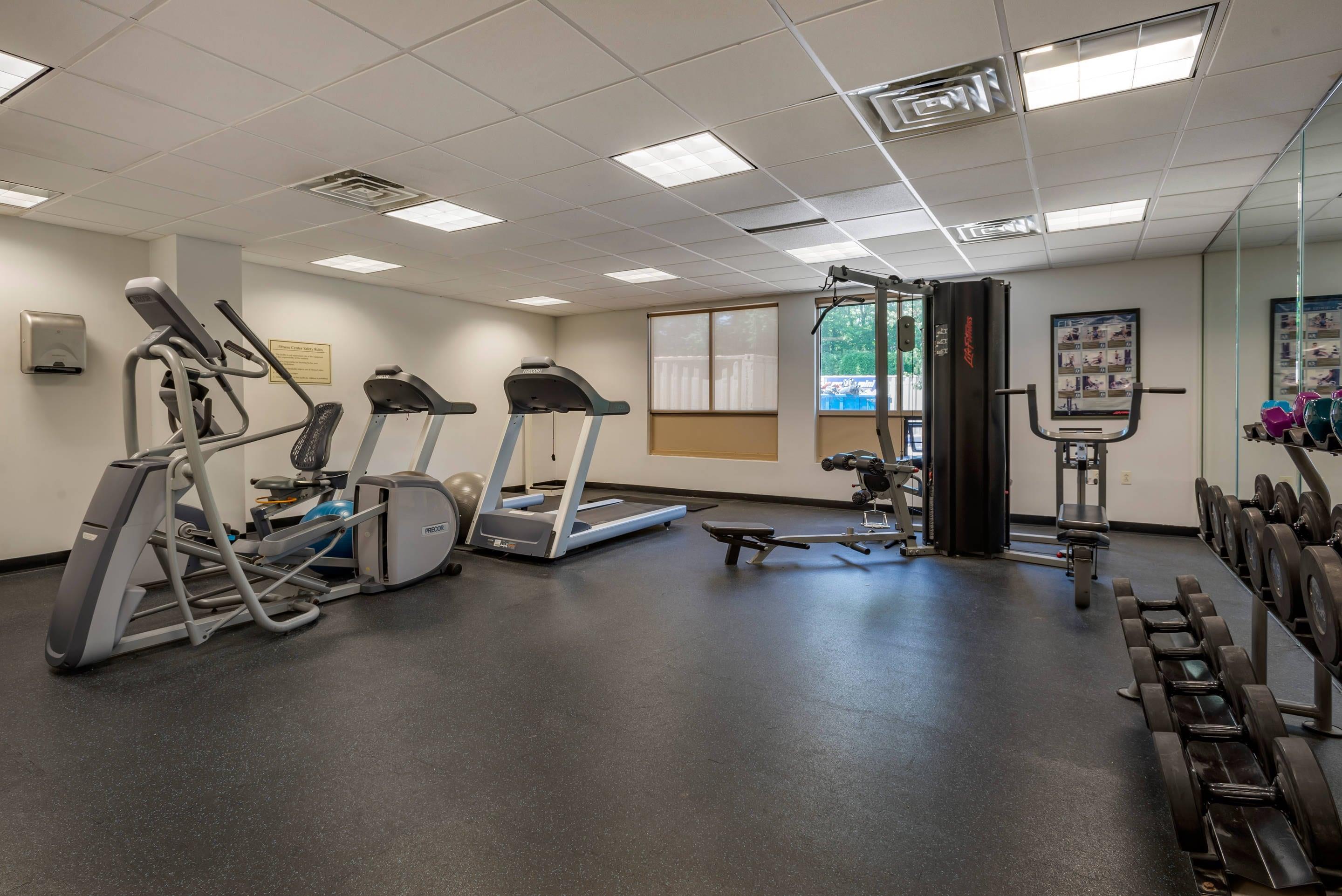 Exercise room with cardio equipment and weights | MainStay Suites Horsham - Philadelphia