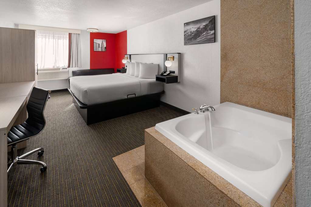 SYLO HOTEL DENVER AIRPORT, A RAMADA-guestroom-Guest Room,Tub - Jetted,Suite,On-Site.jpg
