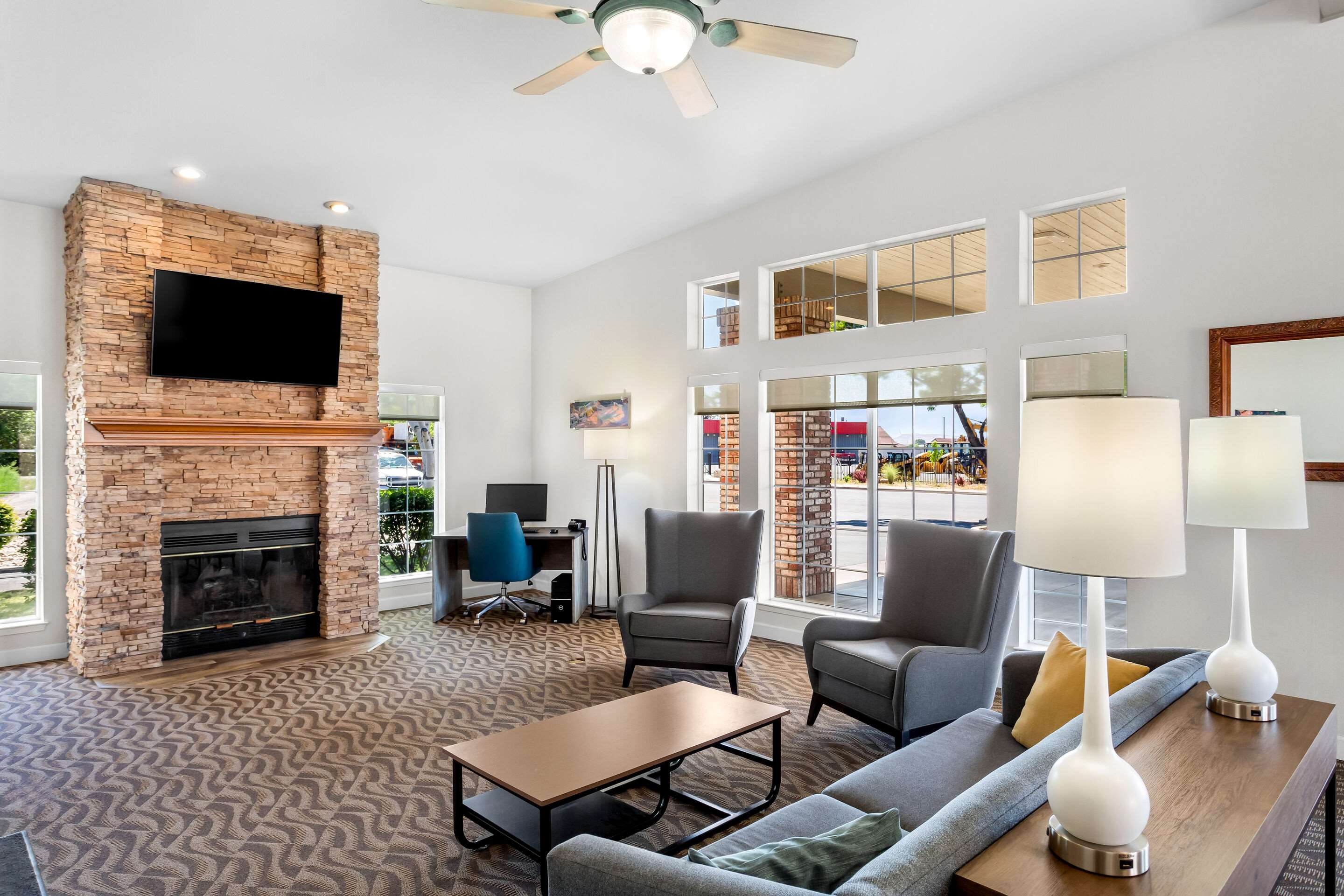 Spacious lobby with sitting area | Comfort Inn & Suites
