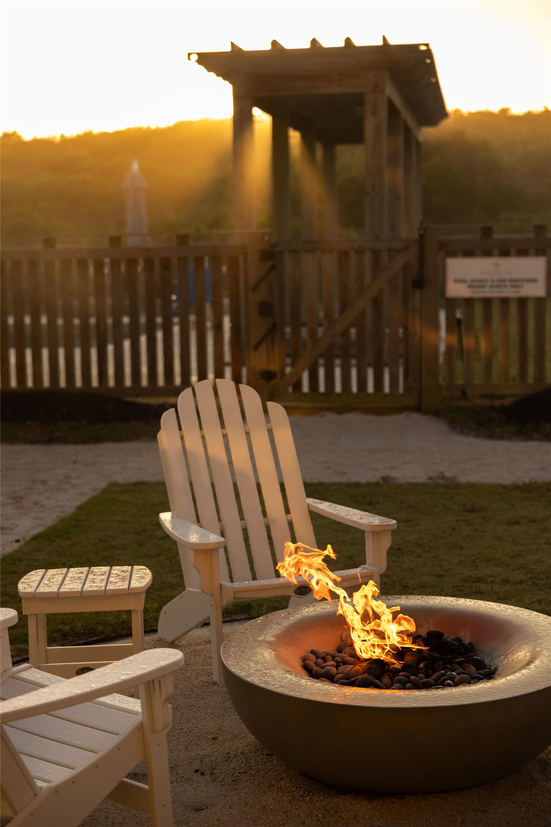 Fire Pit at Sunrise | Sanderling Resort Residences