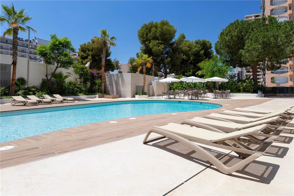 HALLEY HOTEL & APARTMENTS AFFILIATE-guestroom-Guest Room,Guest Room Amenity,Pool,Architecture,On-Site,Outdoor/Exterior,People,Exterior View of Building,Family.jpg