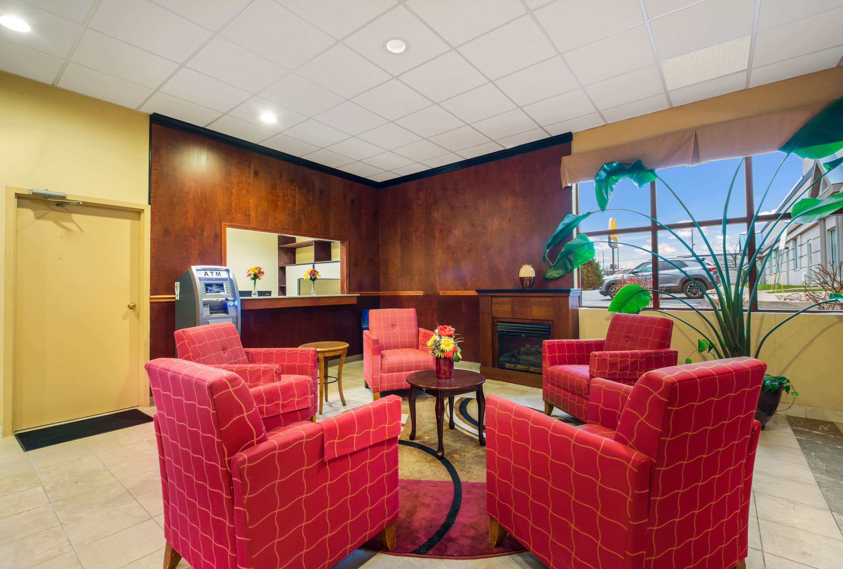 Spacious lobby with sitting area | Suburban Studios Buffalo Airport