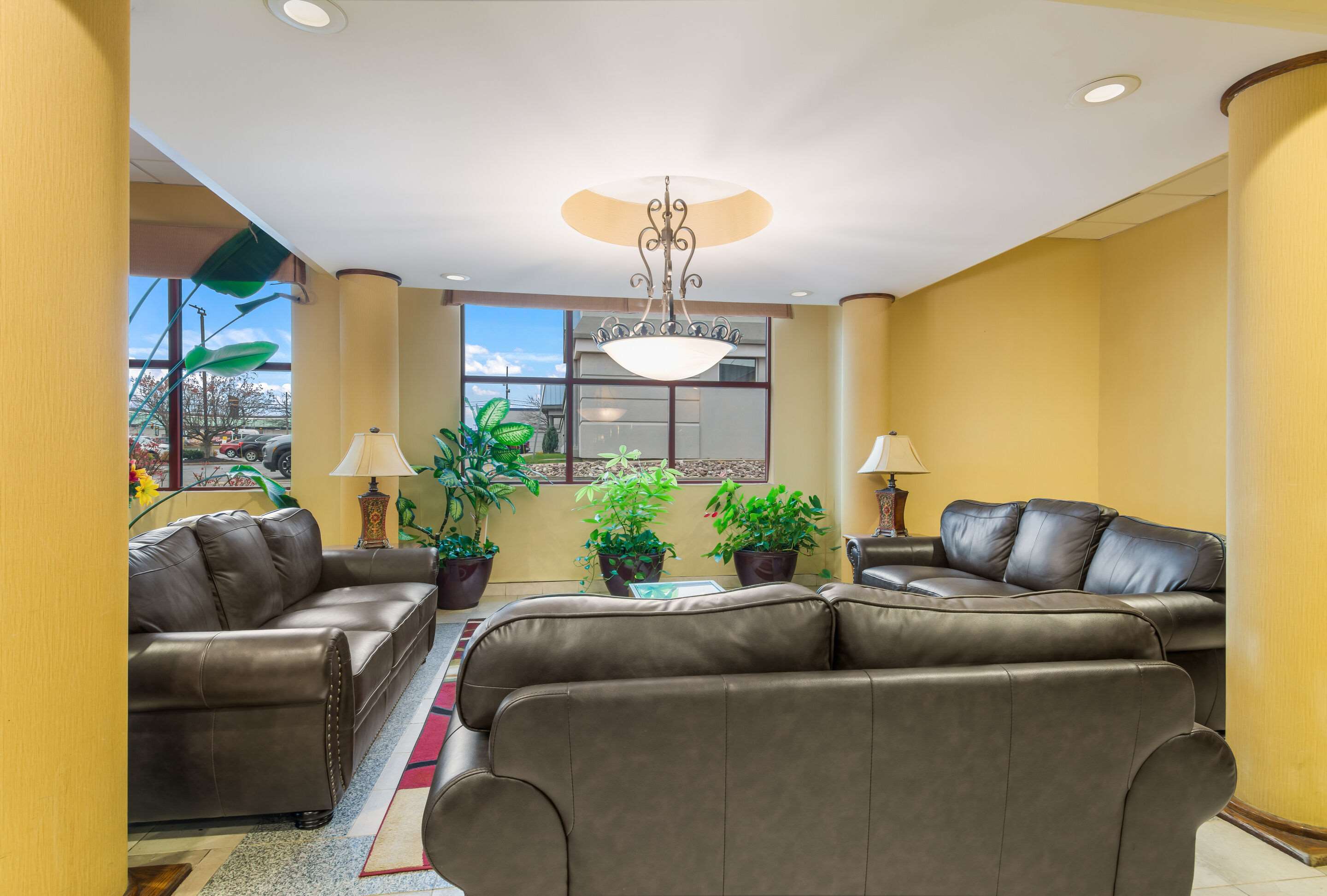 Spacious lobby with sitting area | Suburban Studios Buffalo Airport