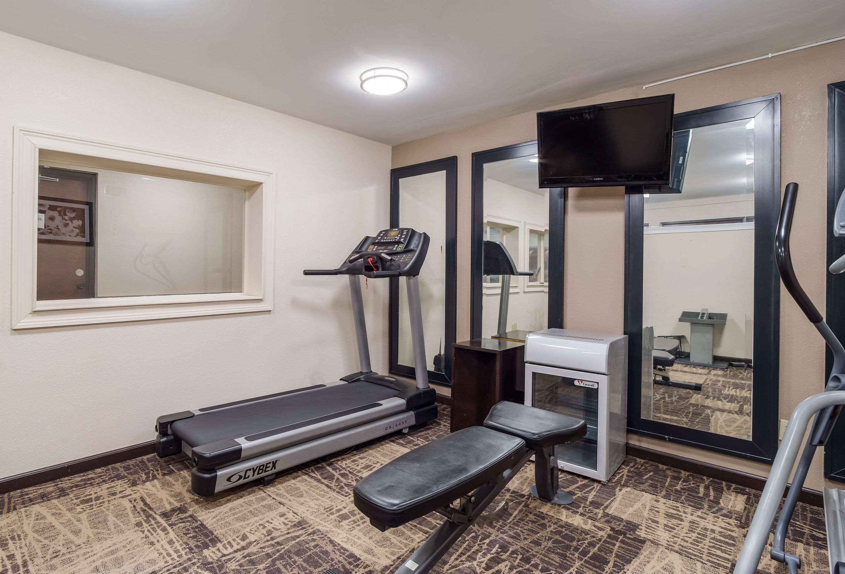 Exercise room with cardio equipment | Quality Inn & Suites Fort Gordon