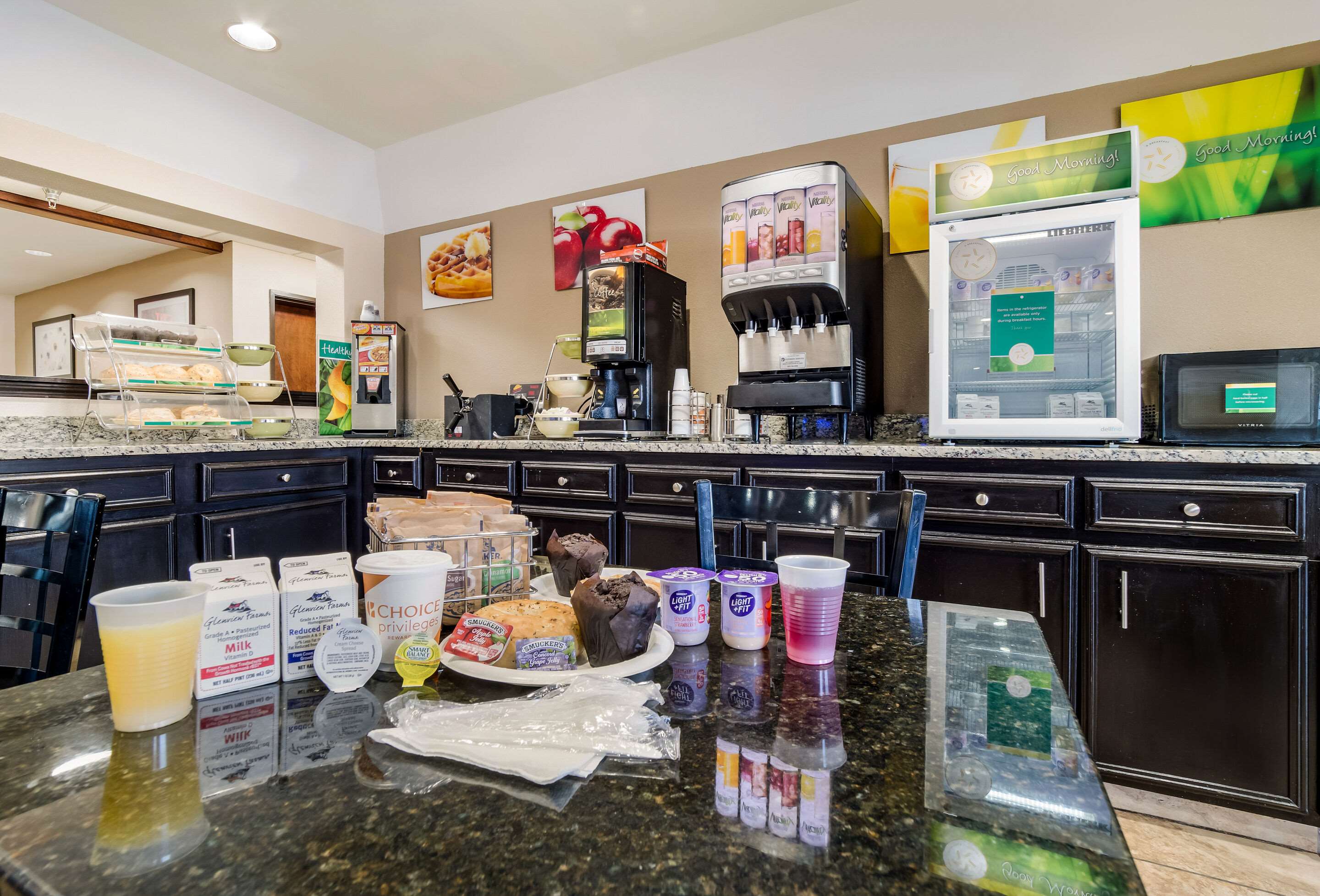 Enjoy breakfast in this seating area | Quality Inn & Suites Fort Gordon