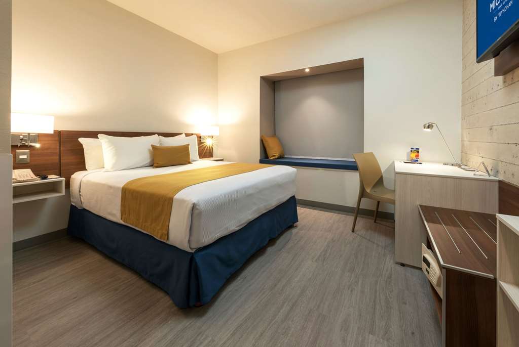 MICROTEL INN & SUITES BY WYNDHAM GU-guestroom-Guest Room,On-Site.jpg
