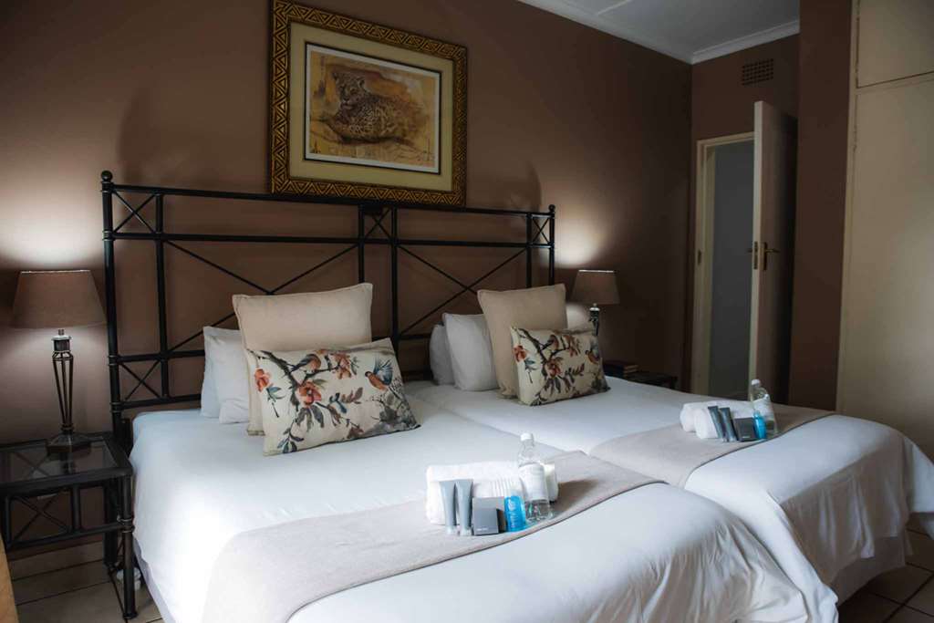GREENFIELDS GUEST HOUSE-guestroom-Guest Room,On-Site.jpg