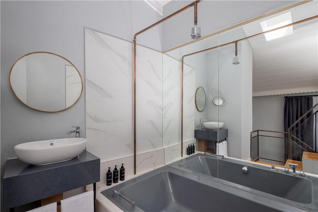COUR DES LOGES, RADISSON COLLE-guestroom-Guest Room,Bathroom,Suite,On-Site.jpg