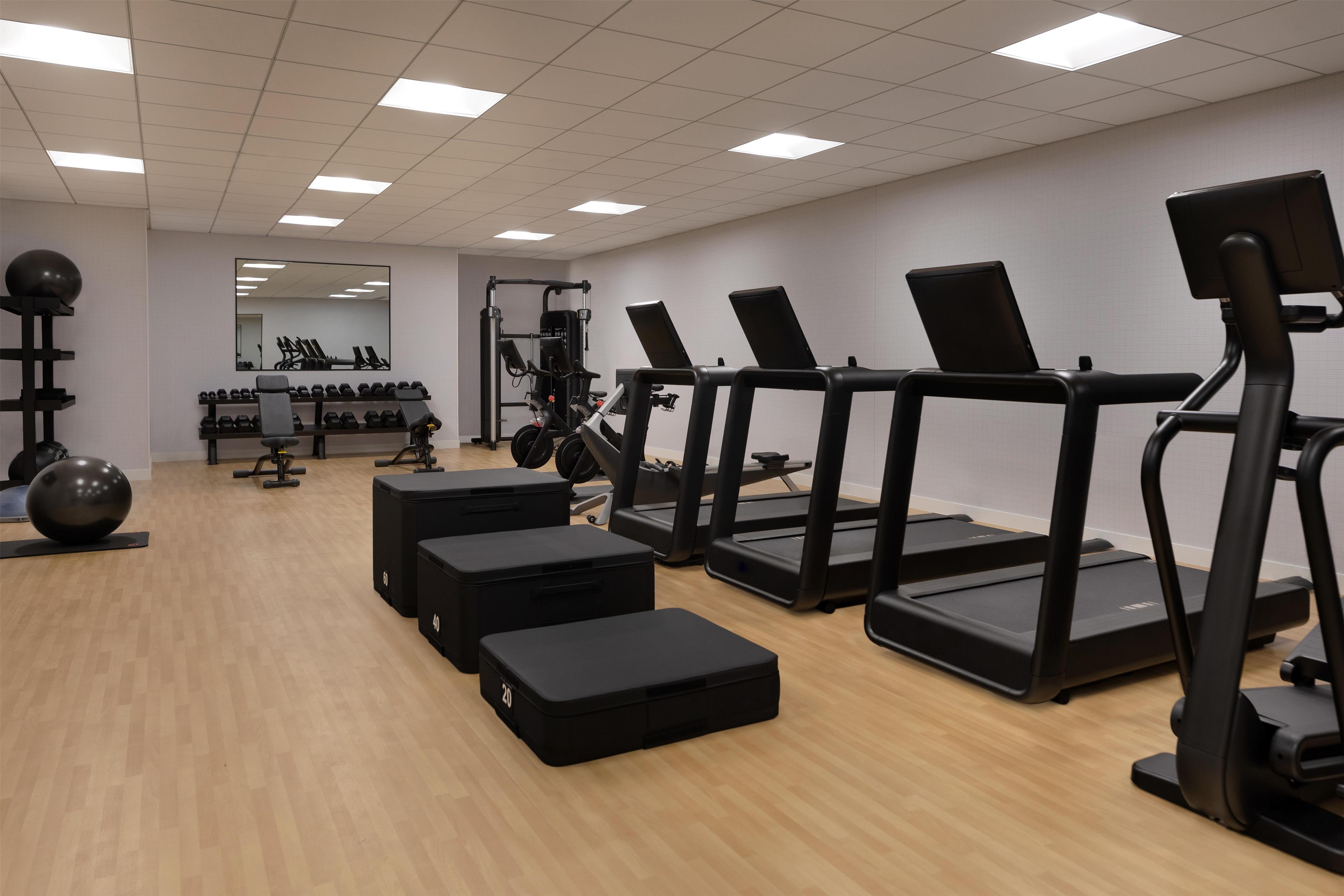 Health club fitness center gym | The Slate Denver, Tapestry Collection By Hilton