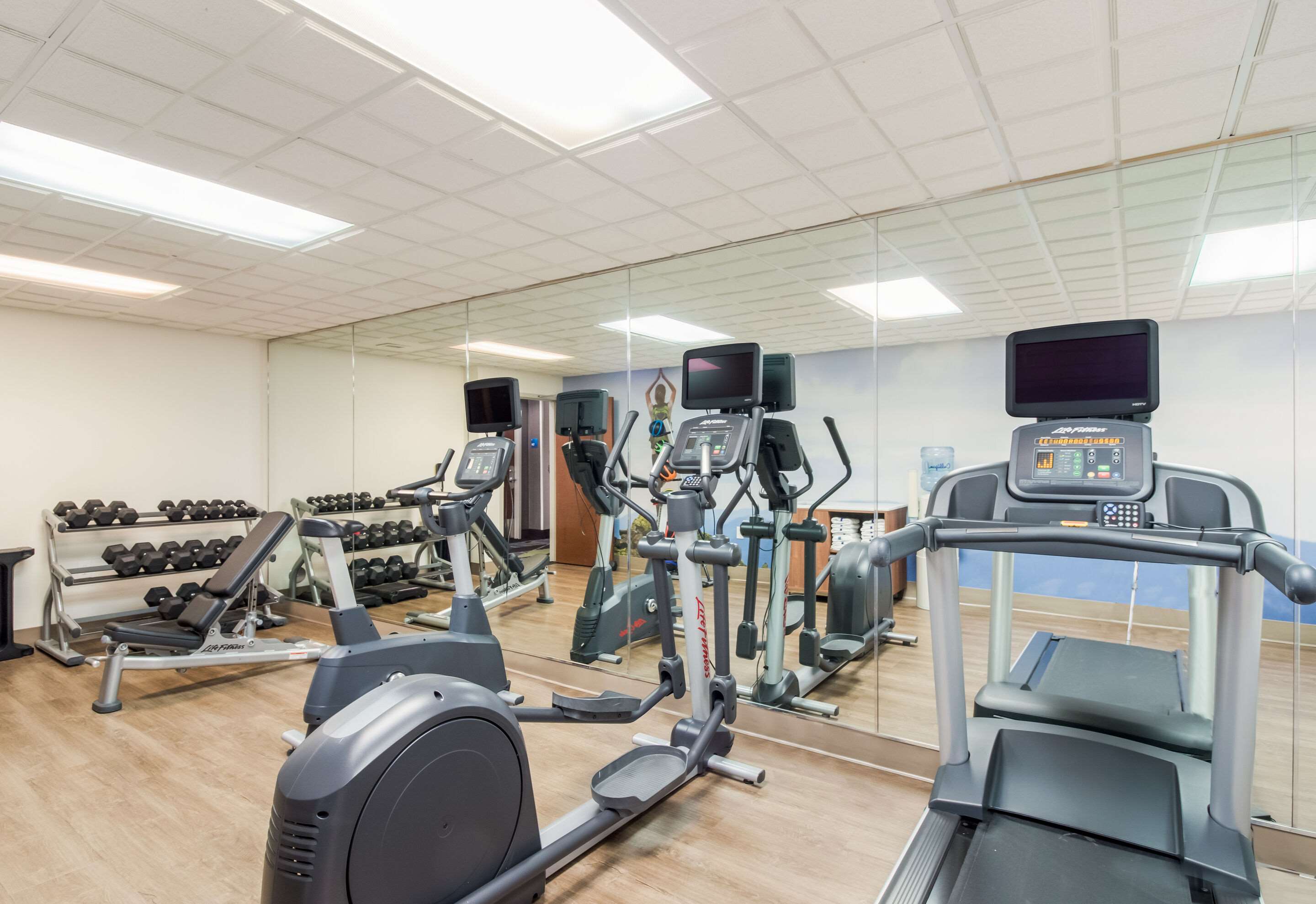 Exercise room with cardio equipment