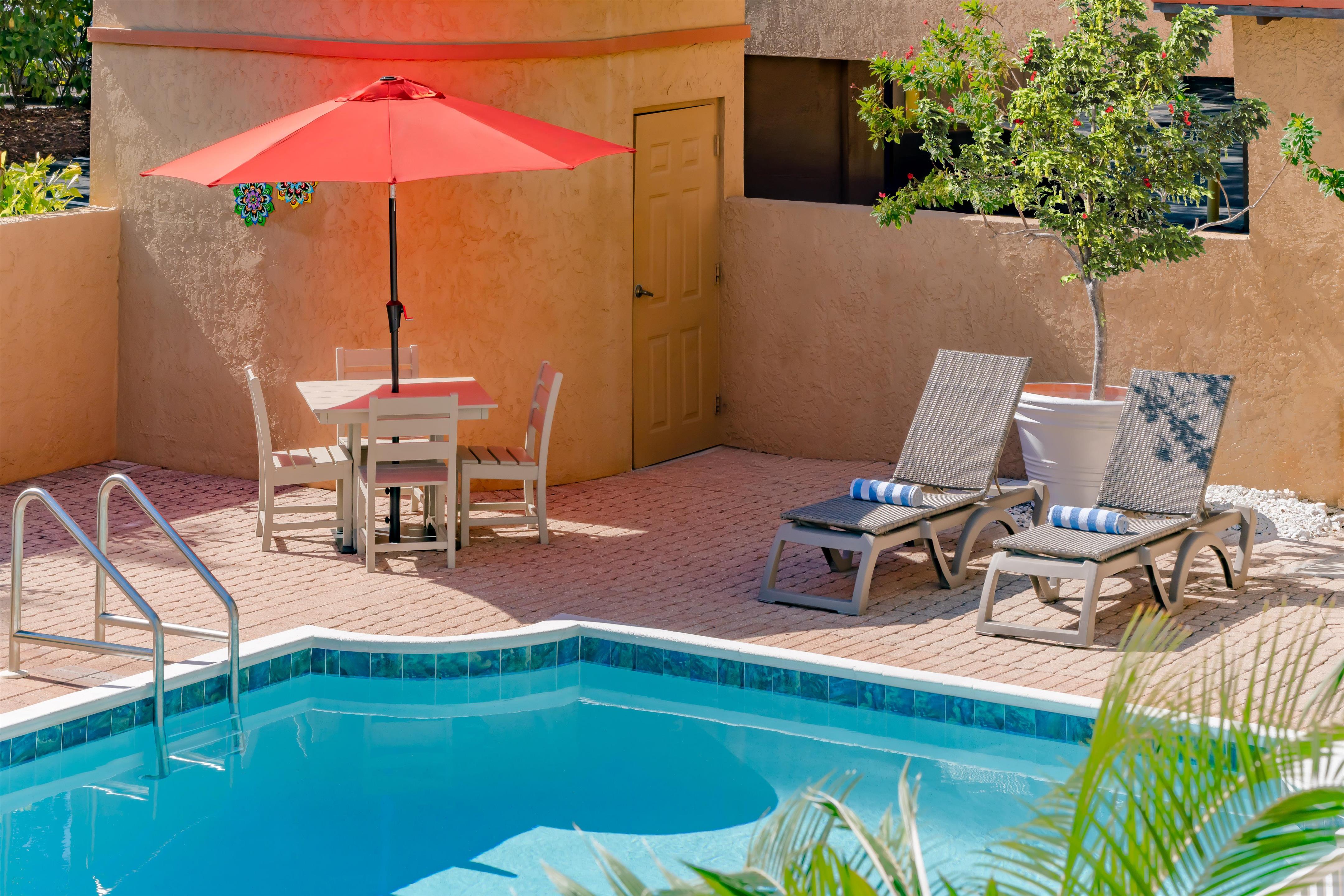 Pool | Inn of Naples, Tapestry Collection by Hilton