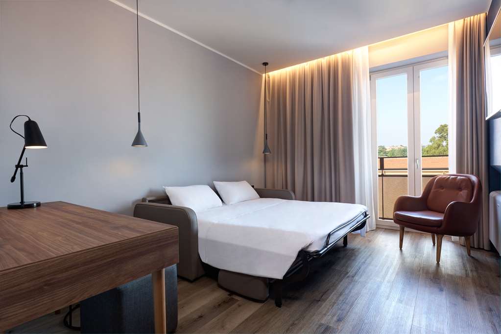 RADISSON HOTEL FERRARA-guestroom-Guest Room,Suite,On-Site.jpg