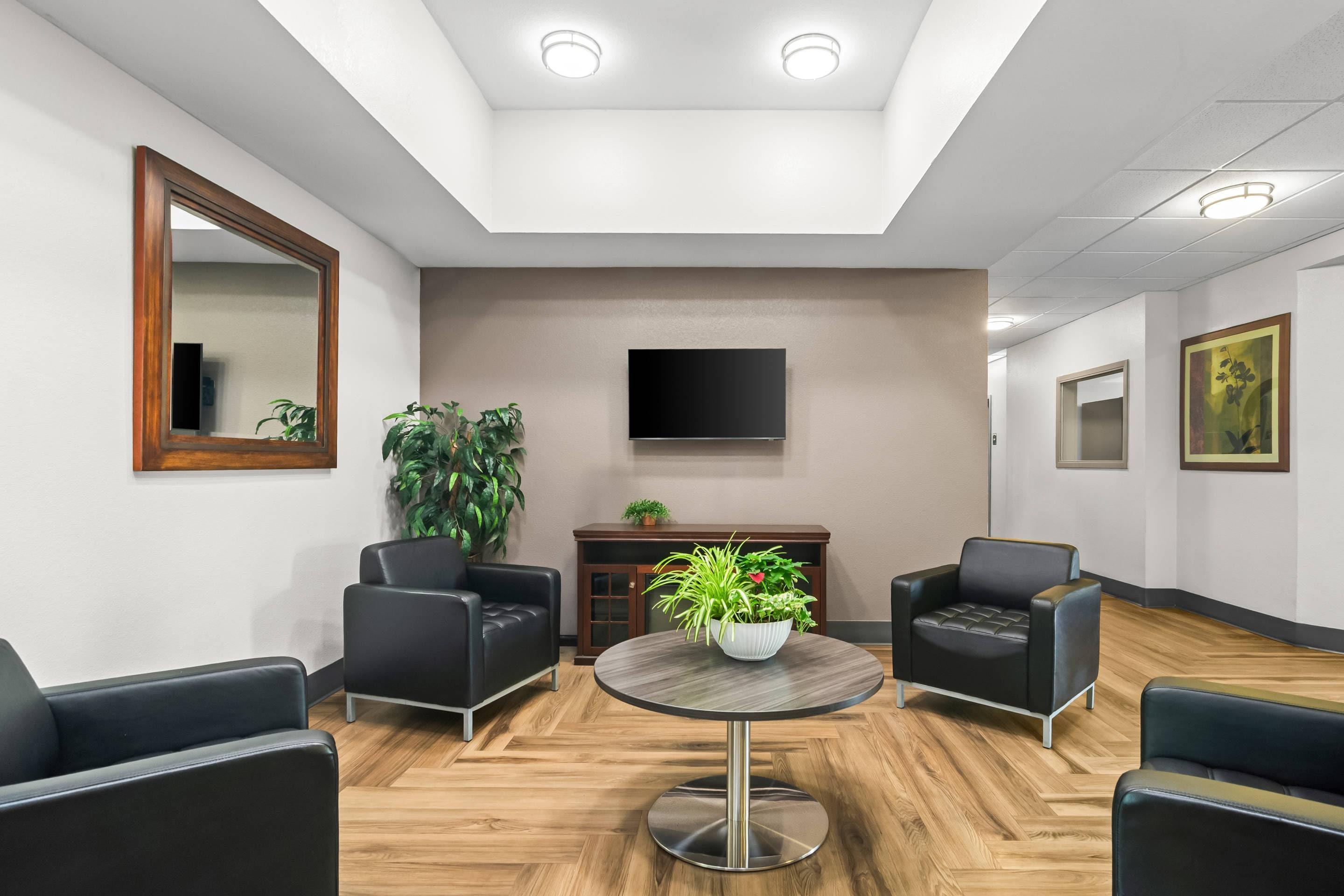 Lobby with sitting area | Suburban Studios Fort Smith