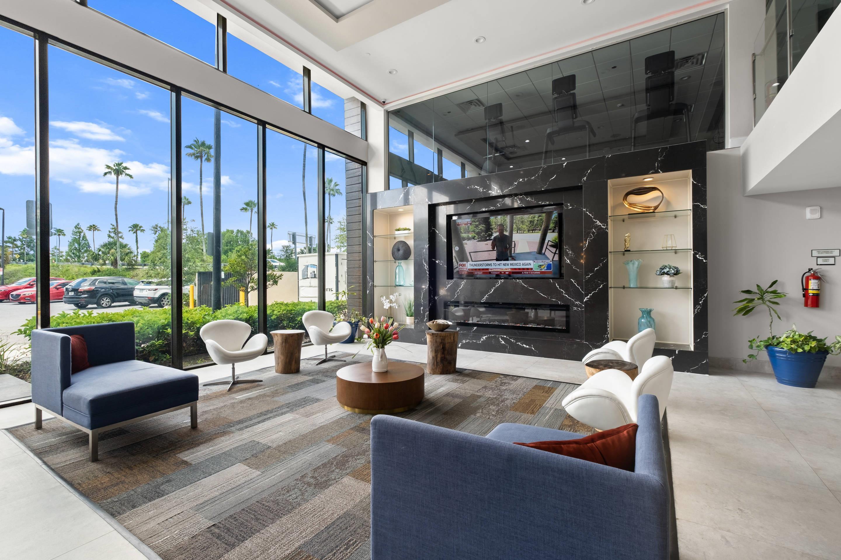 Spacious lobby with sitting area | Cambria Hotel Orlando Universal Blvd