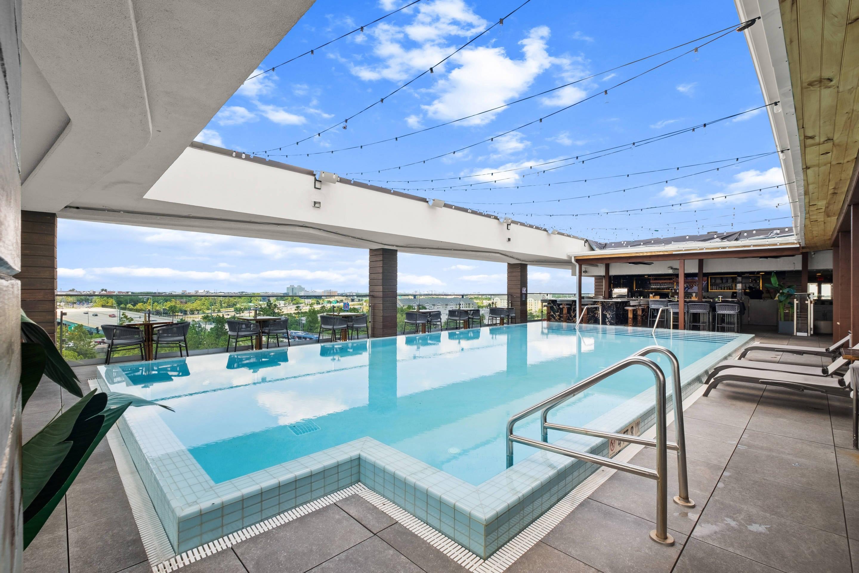 Relax by the pool | Cambria Hotel Orlando Universal Blvd