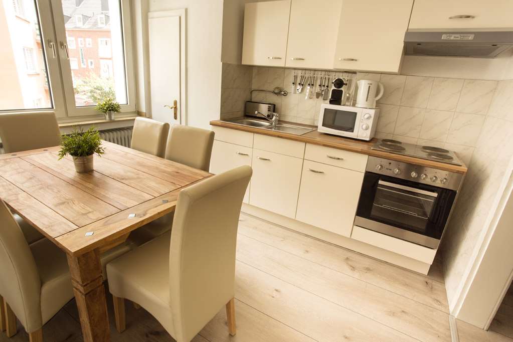 Stadthotel Juelich-guestroom-Guest Room,Guest Room Amenity,Kitchen/Kitchenette,On-Site.jpg