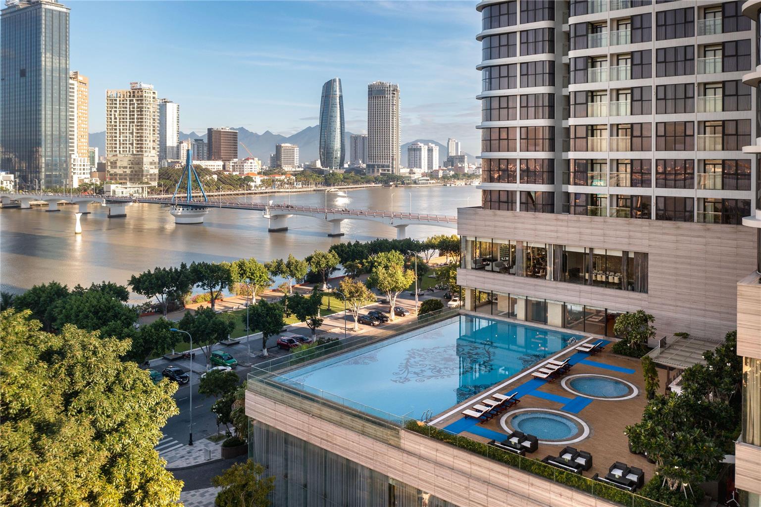 MELIA VINPEARL DANANG RIVERFRONT-guestroom-Guest Room,Guest Room Amenity,Pool,Architecture,On-Site,Outdoor/Exterior,City,Waterfront,Exterior View of Building.jpg