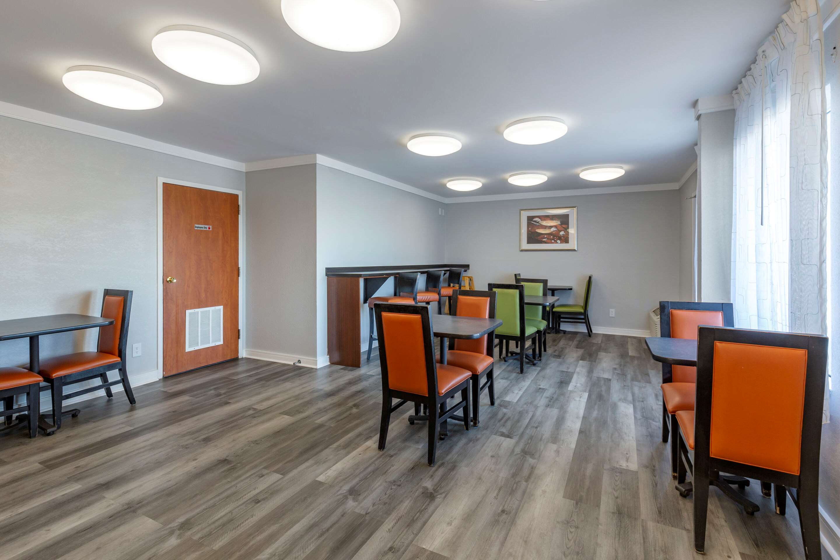 Enjoy breakfast in this seating area | Quality Inn Near Fort Liberty formerly Ft. Bragg