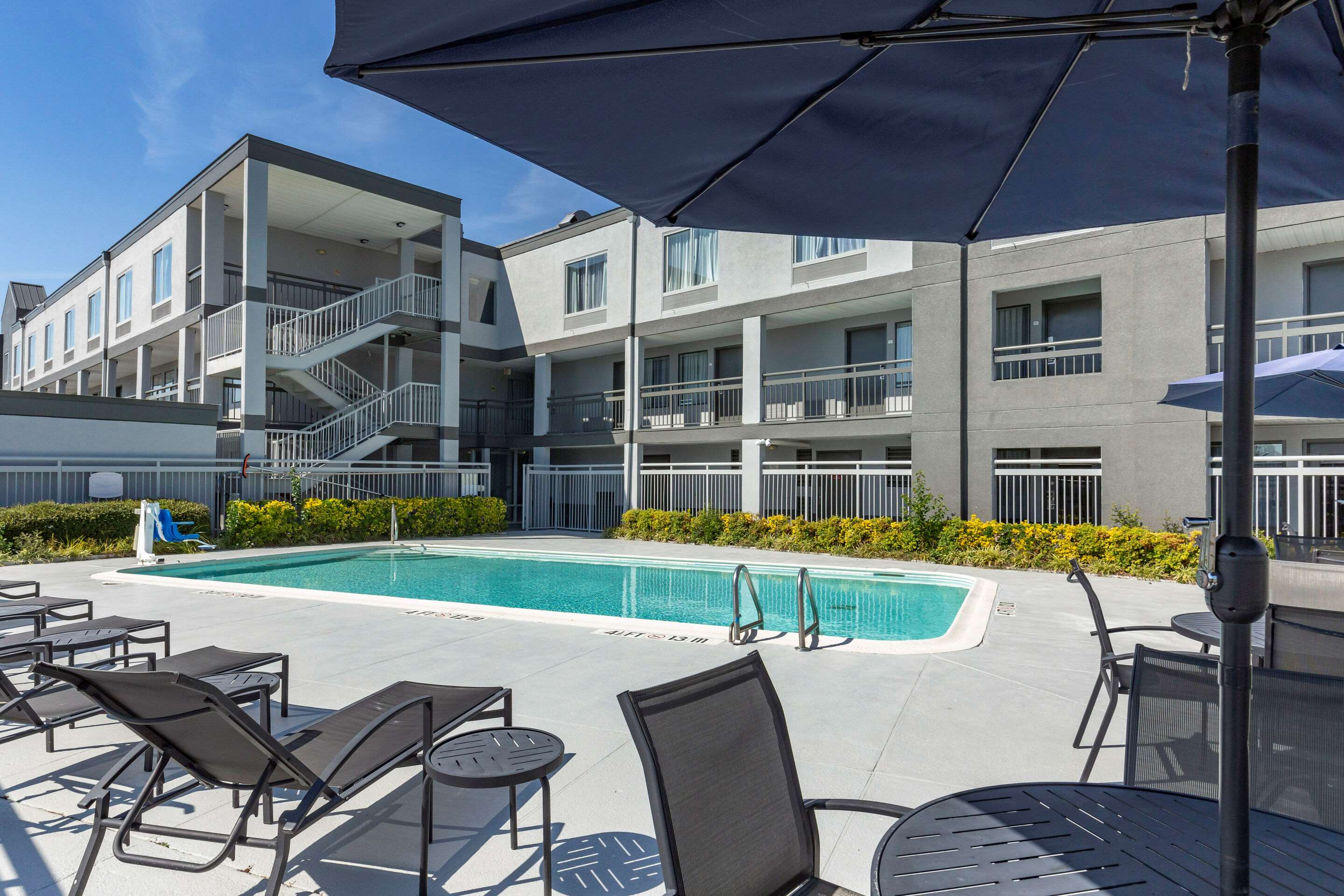 Outdoor pool | Quality Inn Near Fort Liberty formerly Ft. Bragg