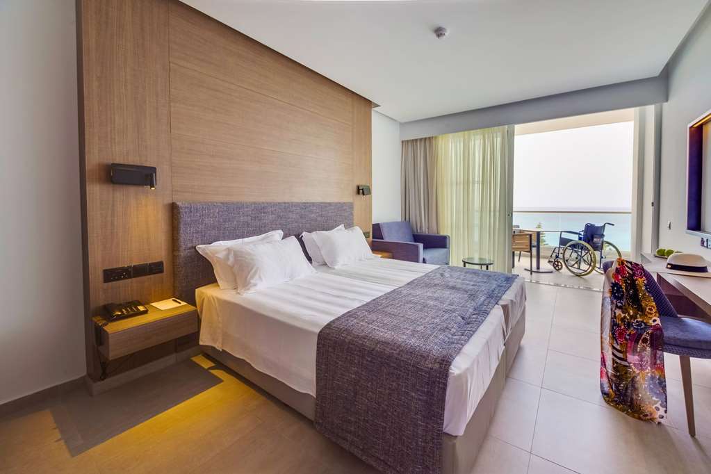 CAVO MARIS BEACH HOTEL-guestroom-Guest Room,Suite,On-Site.jpg