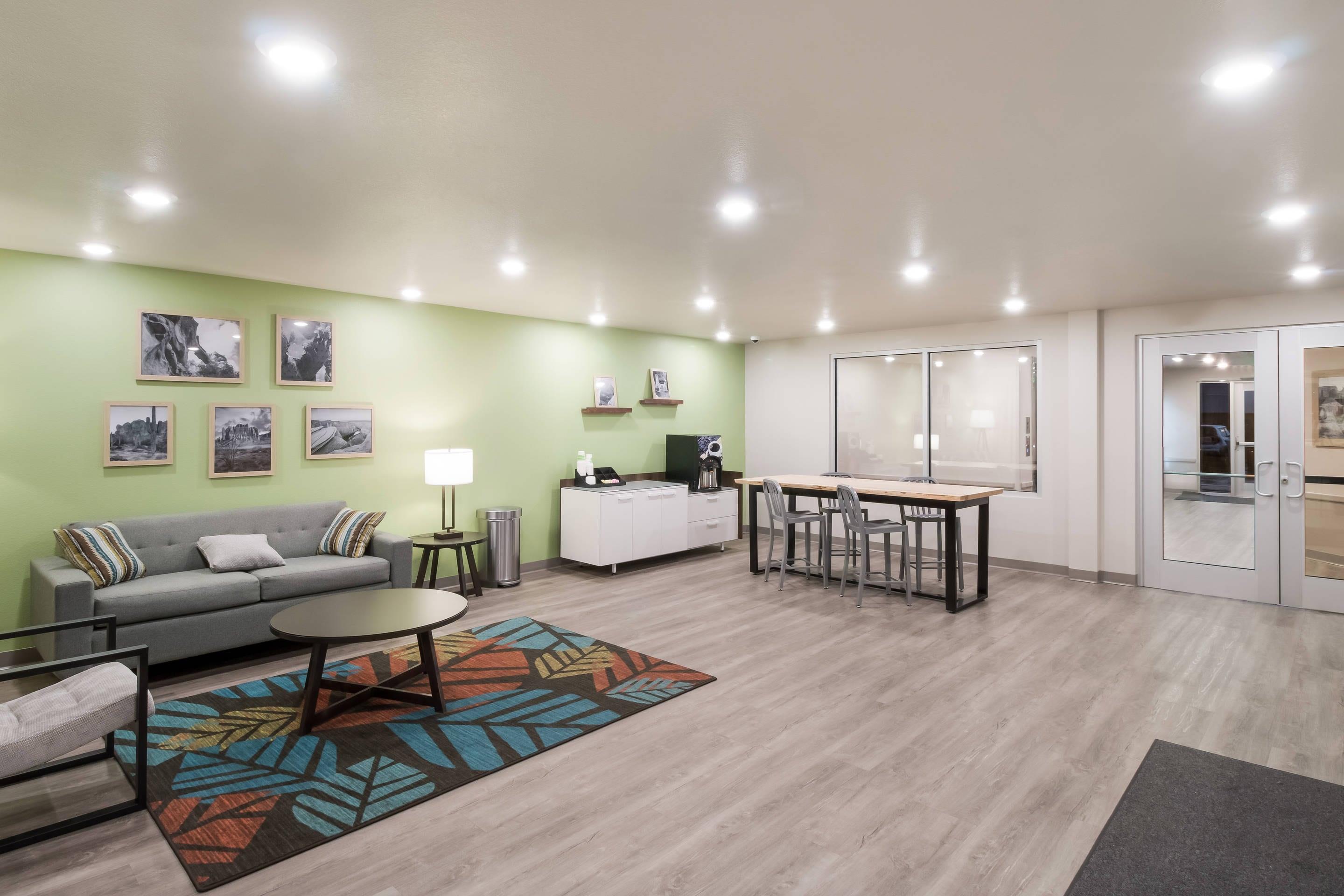 Spacious lobby with sitting area | Woodspring Suites Mesa Chandler