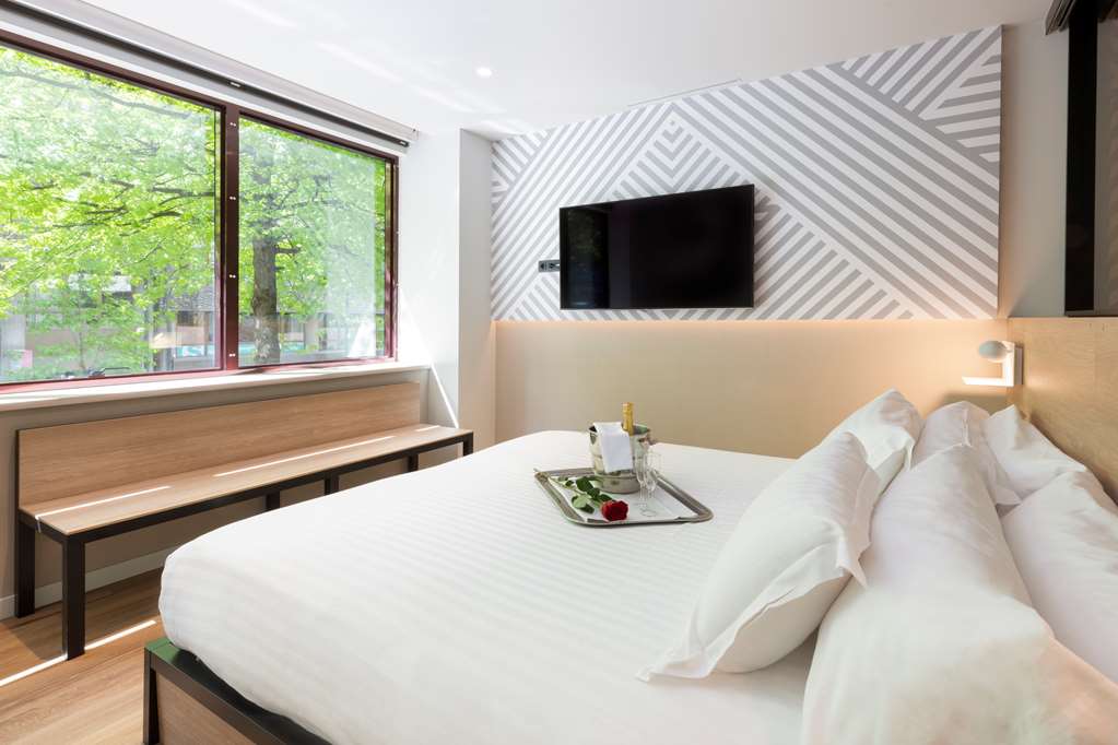SUITES PLAZA HOTEL AND WELLNES-guestroom-Guest Room,Suite,On-Site.jpg
