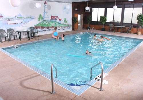Indoor Pool | Lighthouse Inn - Two Rivers