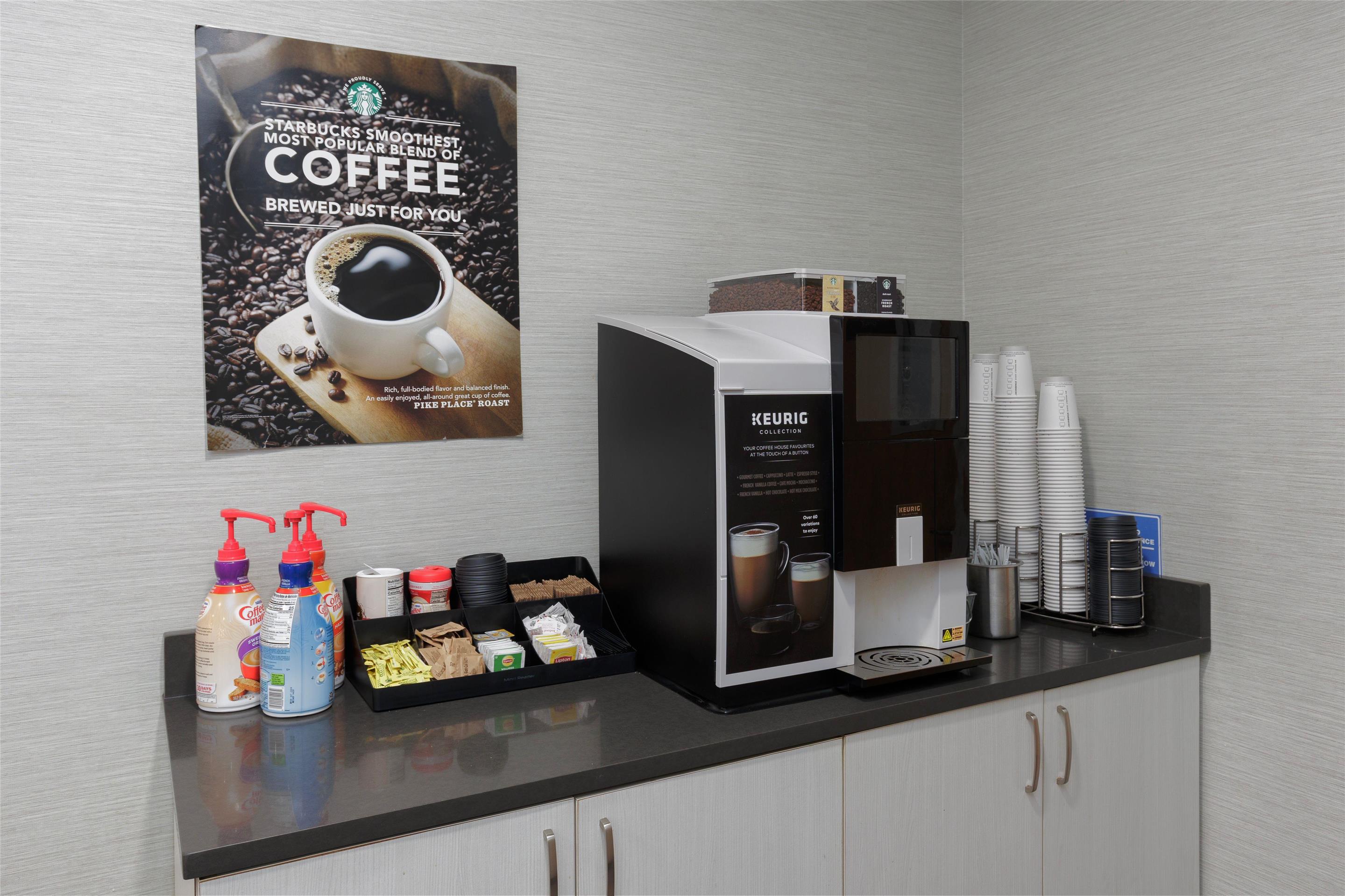 Free Starbuck Coffee Station | Orangewood Inn & Suites Kansas City Airport