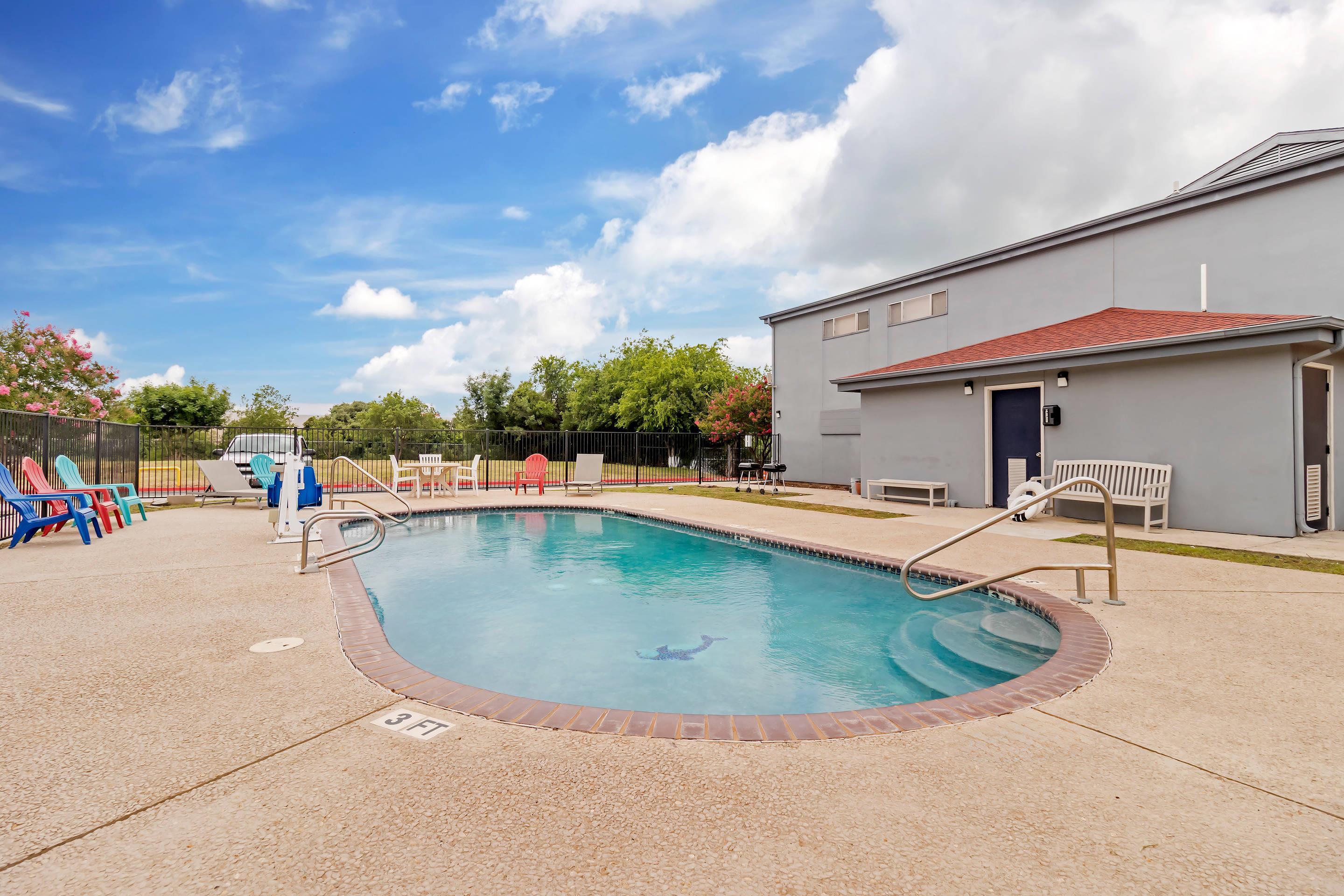 Outdoor pool | Quality Inn & Suites